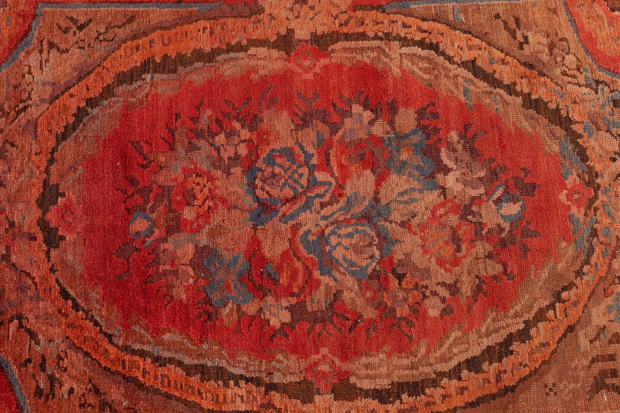 1900s Caucasian Karabagh handmade wool carpet in red, orange and brow
Size: 7'9