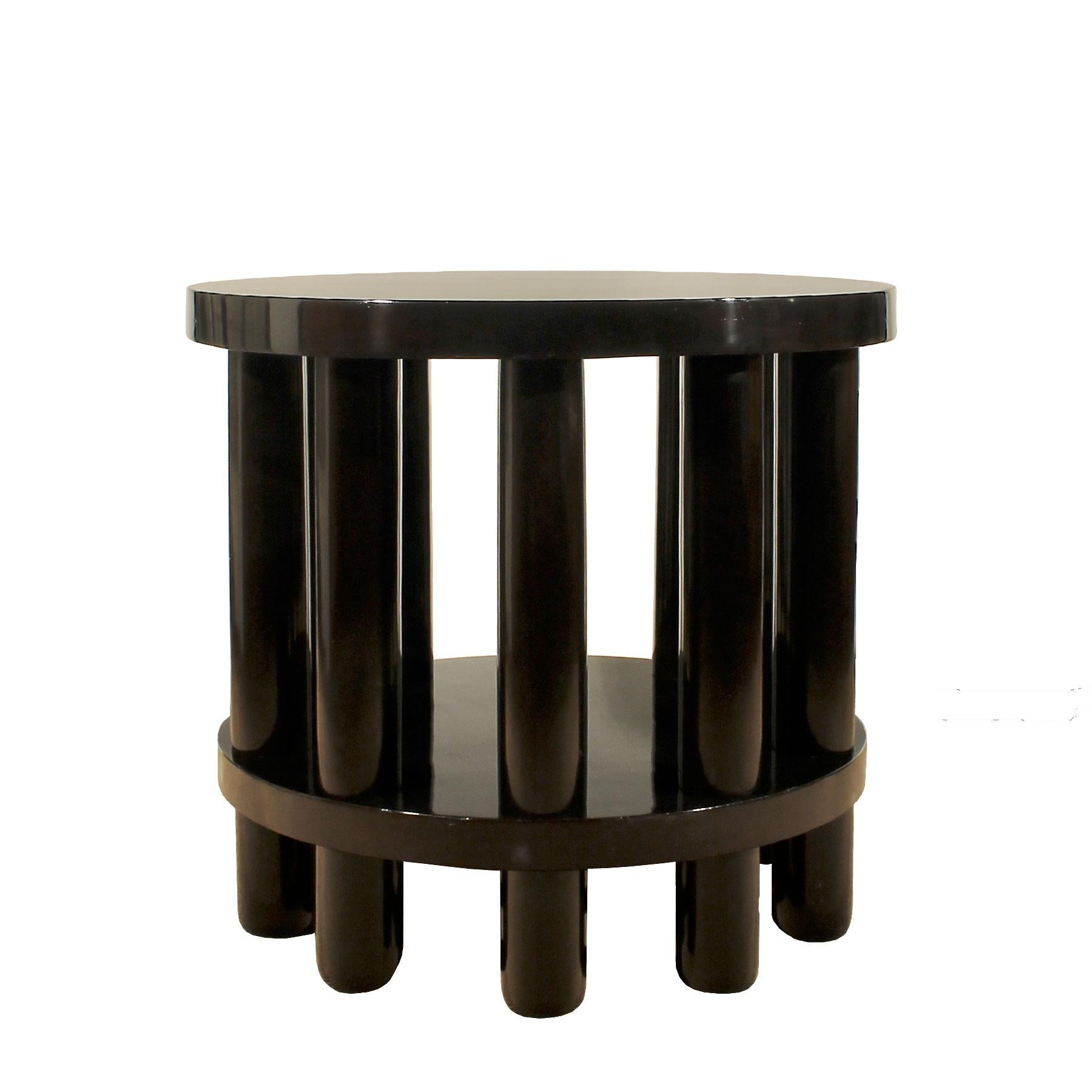 Spectacular center table with ten columns fixed by wood screw system, solid beech and pine wood with mahogany veneer, stained and French polished. High quality.
Design: Adolf Loos,
Austria, Vienna, circa 1900.