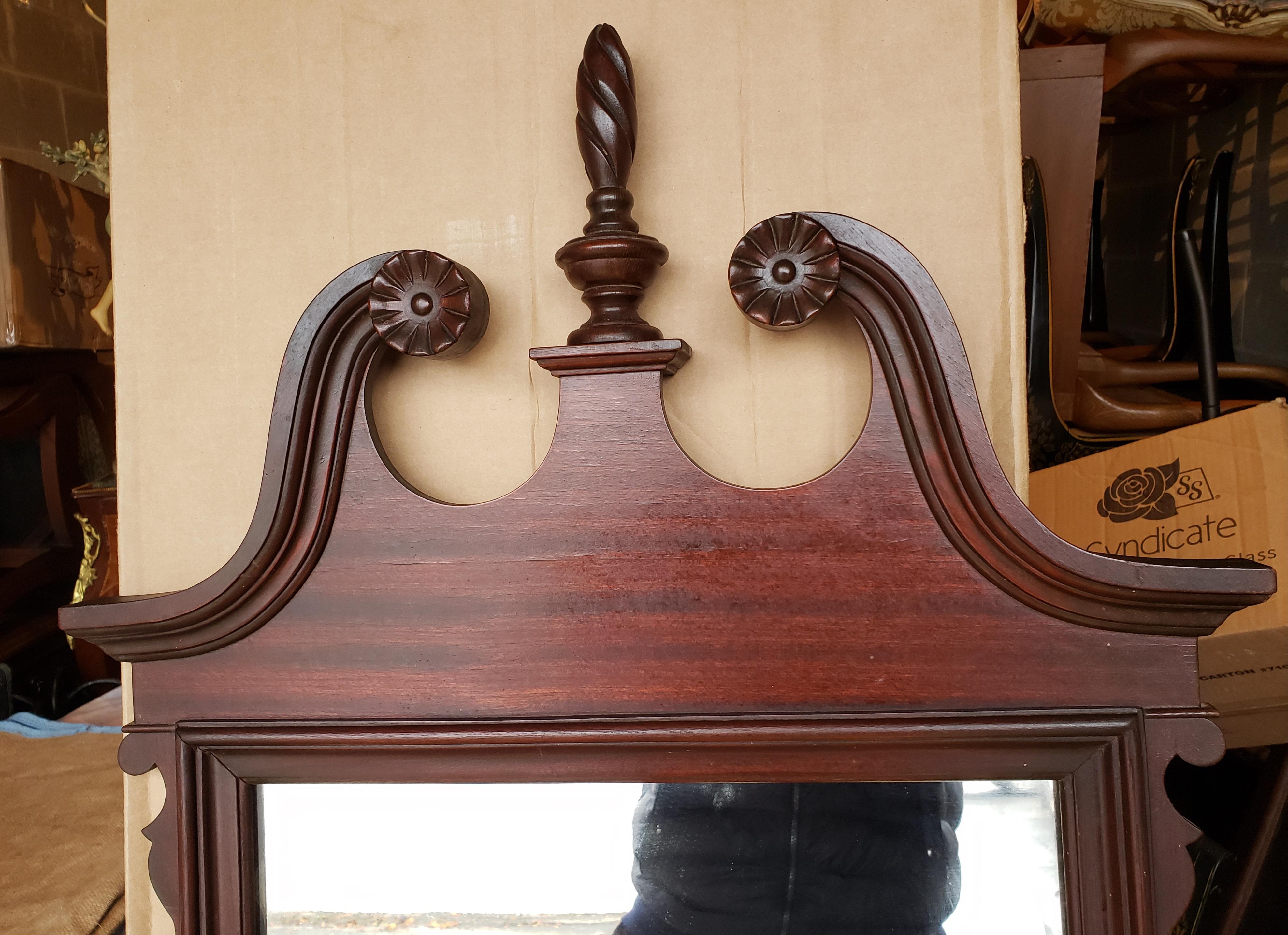 Early 1900s Chippendale Mahogany wall mirror. Good condition with few signs of aging and wear appropriate with age.
Measures 22