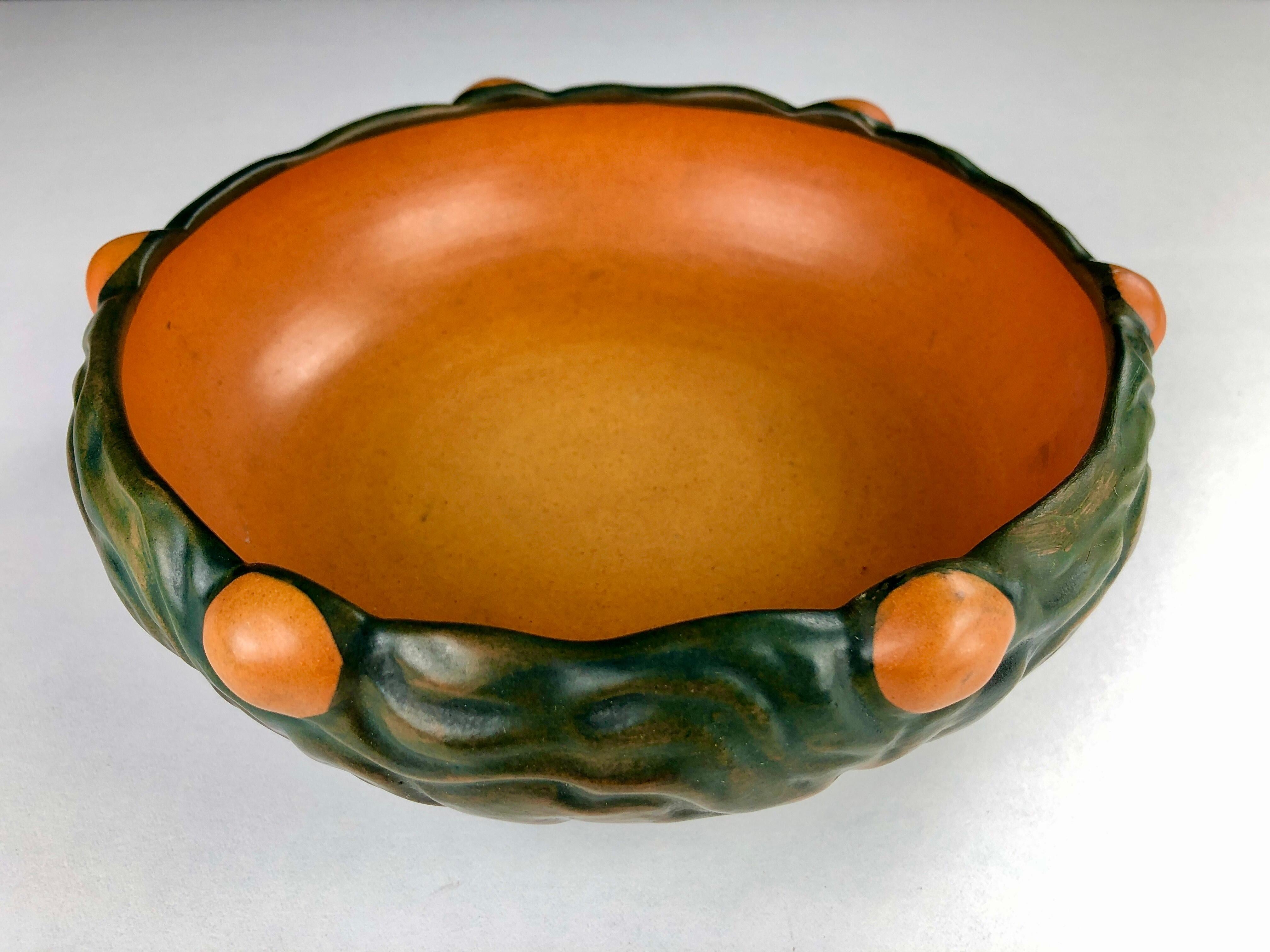 Hand-crafted Danish Art Nouveau bowl by Thorvald Bindesboell for P. Ipsens Enke designed in 1905

The bowl is in good vintage condition.

Thorvald Bindesbøll (1846-1908) is was Denmark's leading ornamental artist of his time. His pronounced