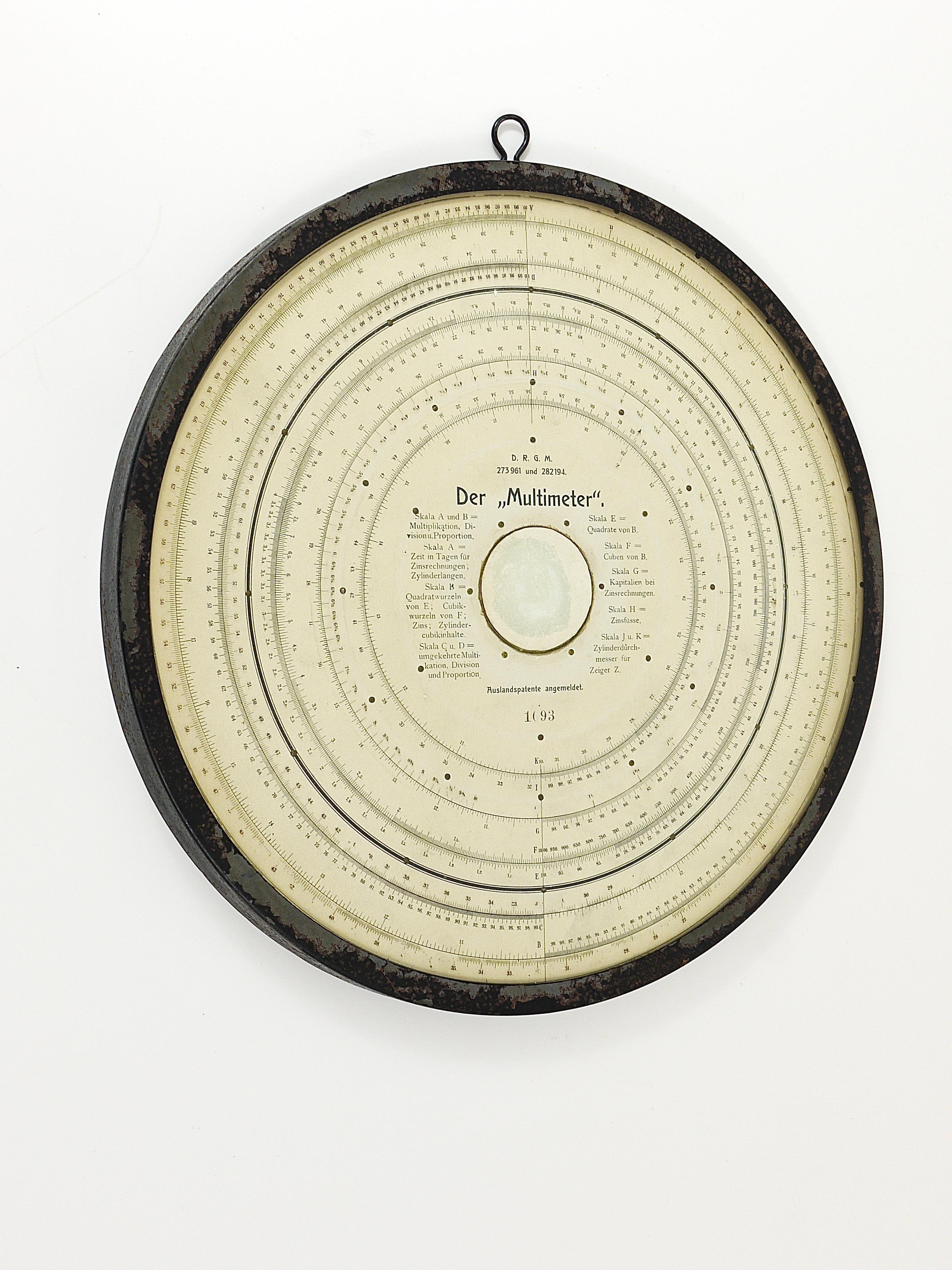 A dekorative appr. 120-year-old, large, wall-mounted round „Multimeter“ analog slide rule calculator. Dated around 1900, made in Germany. It has a rotatable glass disc and offers multiple features like multiplication, division, interest-calculation
