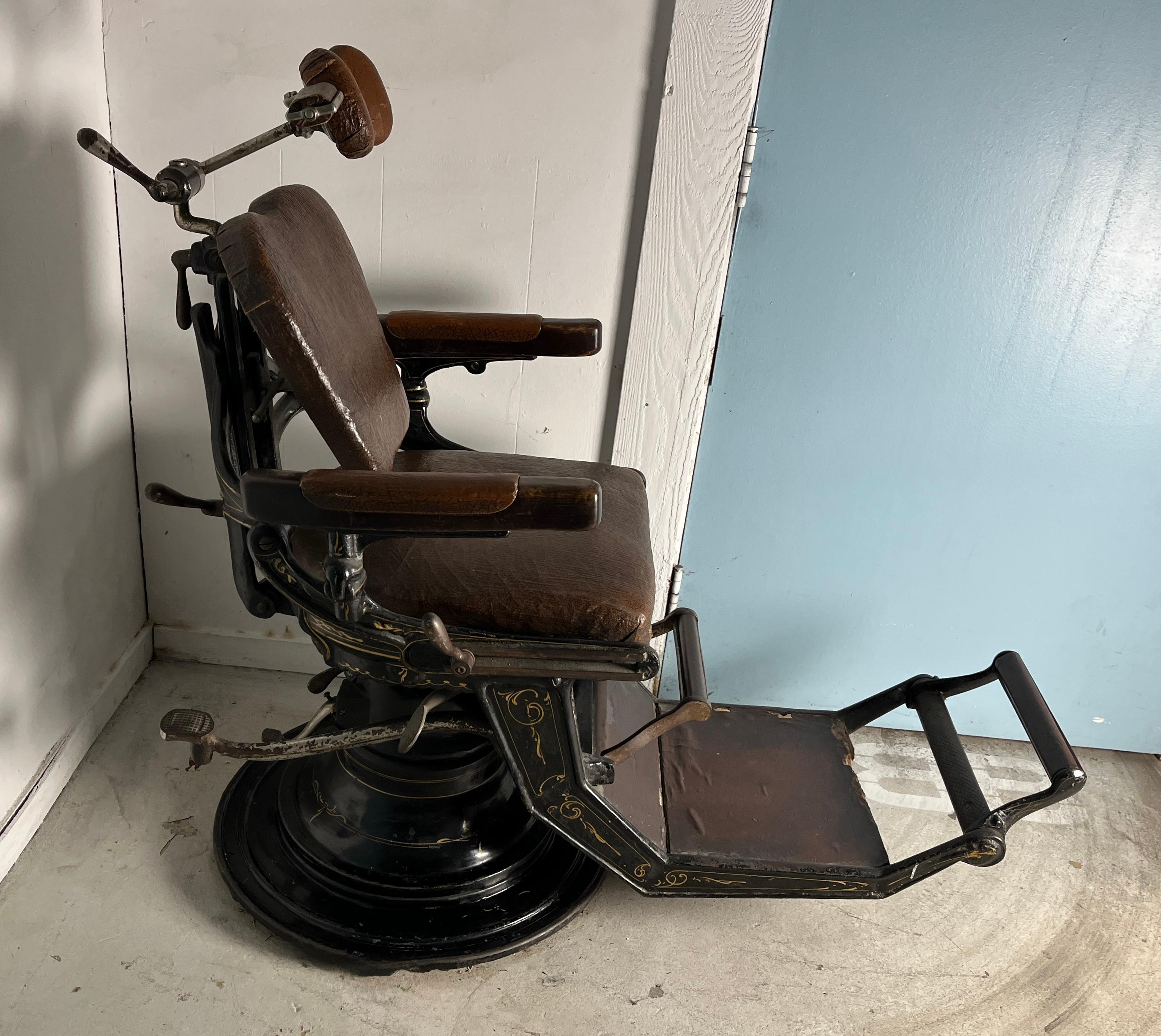 Step into history with this exquisite 19th-century barber’s chair, a true gem imported from France. Featuring a sturdy steel frame and leather upholstery, this chair is both elegant and durable. Intricate hand-painted details enhance its charm,