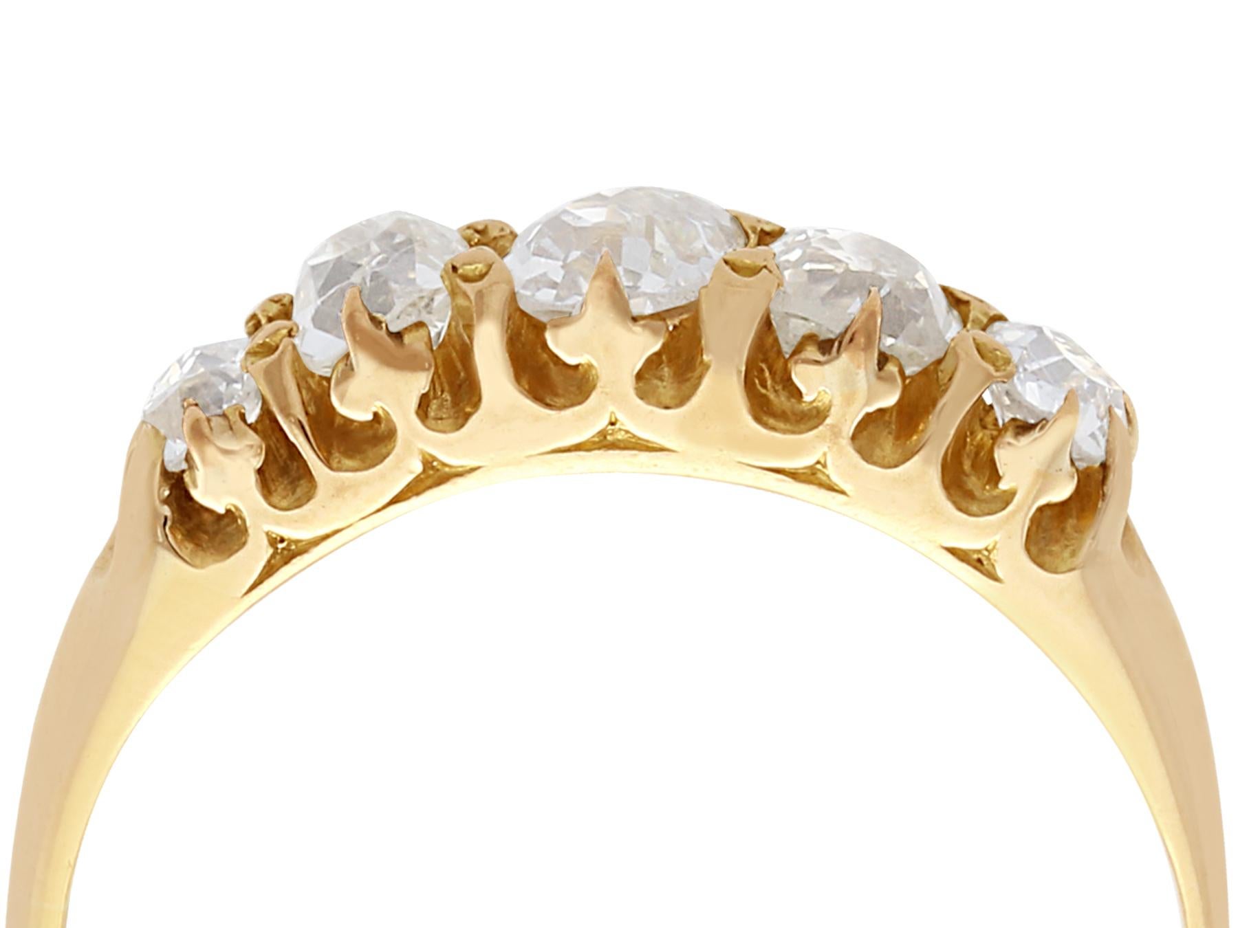 An impressive antique 0.90 carat diamond and 18 karat yellow gold five stone five stone ring; part of our diverse antique jewelry and estate jewelry collections

This fine and impressive Edwardian diamond ring has been crafted in 18k yellow