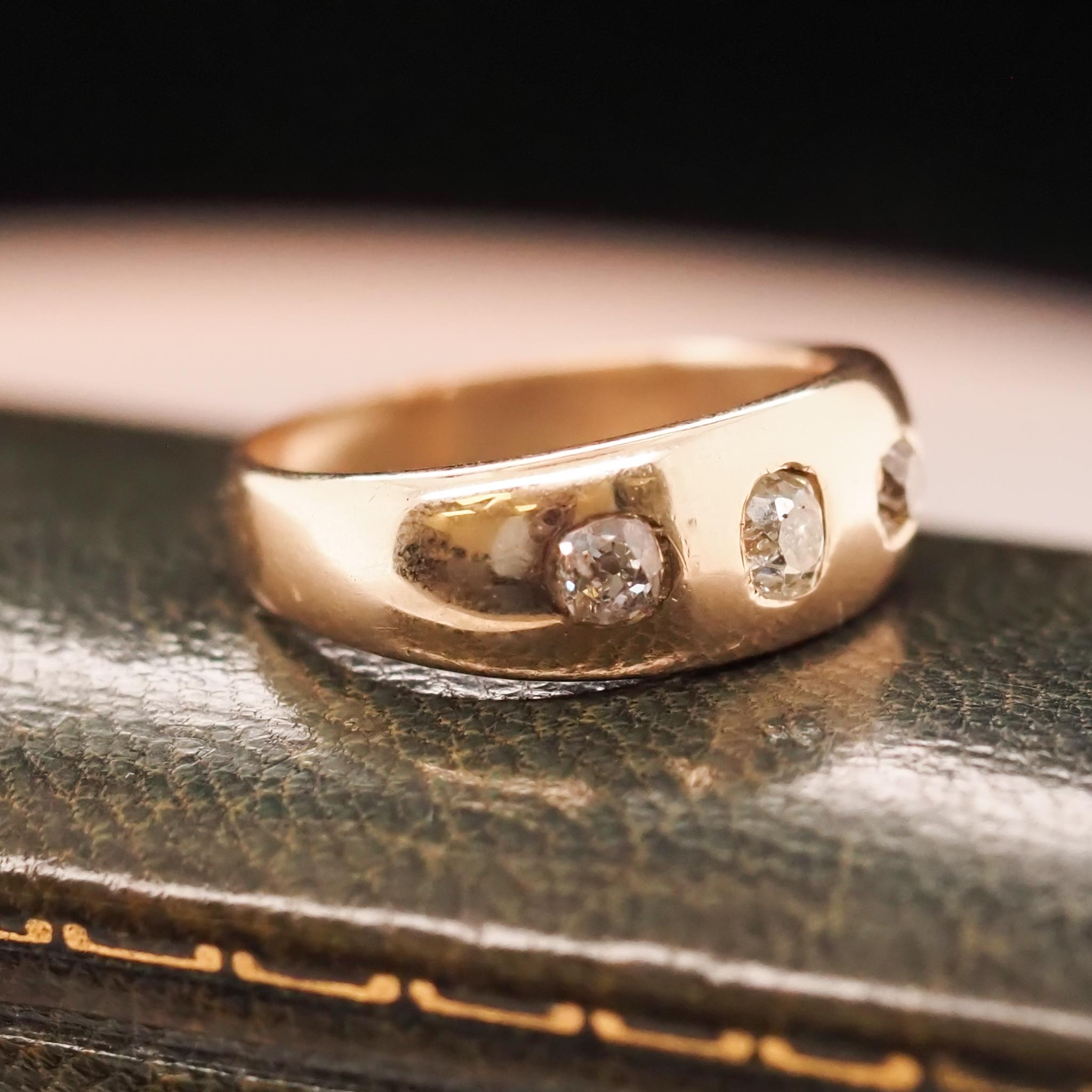 Year: 1900s
Item Details:
Ring Size: 8.75
Metal Type: 14K Yellow Gold [Hallmarked, and Tested]
Weight: 6.7 grams
Diamond Details: .60ct, total weight. Old Mine Brilliant, J/K Color, SI clarity.
Band Width: 3.75mm
Condition: Excellent
Price: $1800