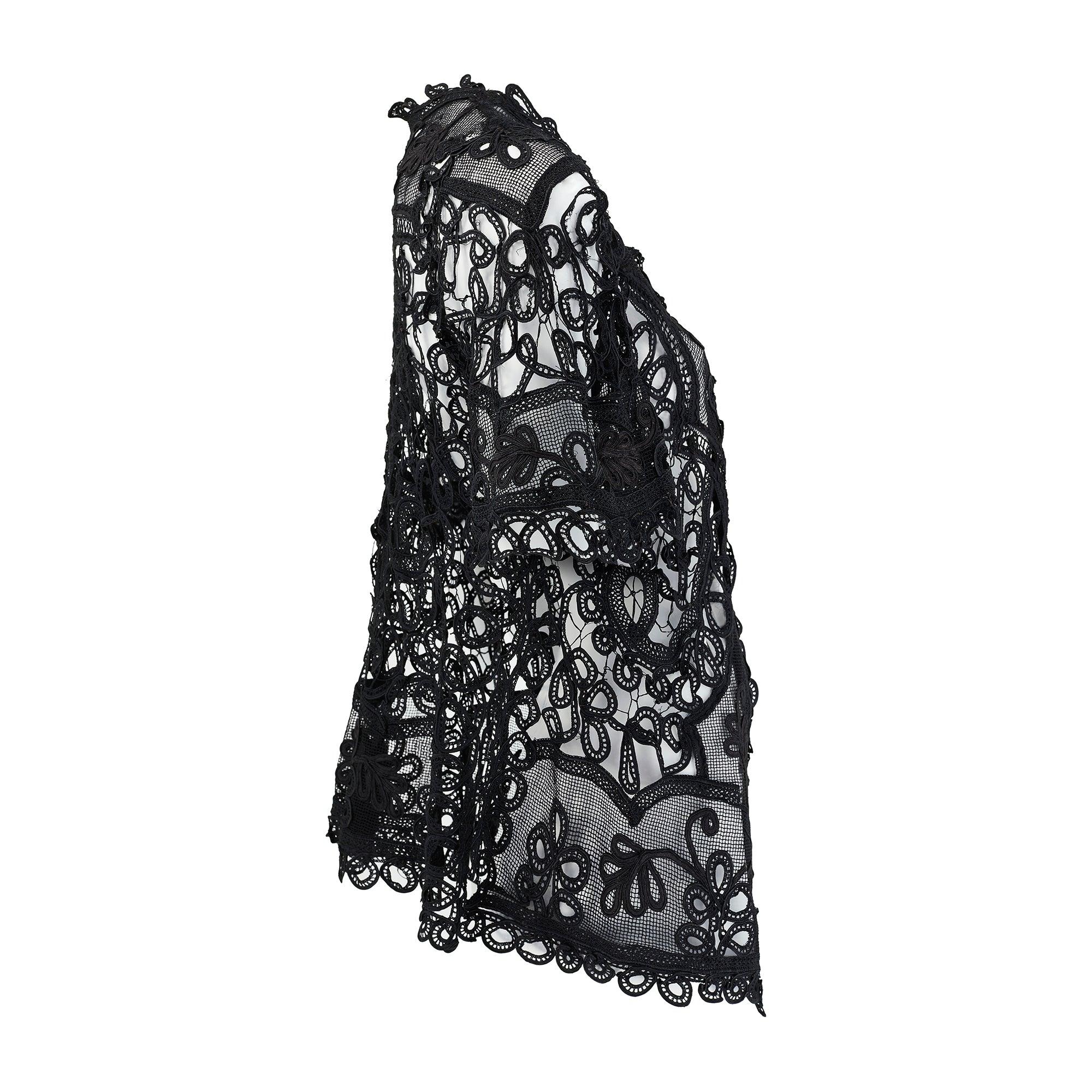 This intricately hand crafted Edwardian jacket dates back to the early 1900s and is a wonderful example of tape or Battenberg lace whereby pieces of tape are bent into the shape required and sewn into position and the gaps are filled in with