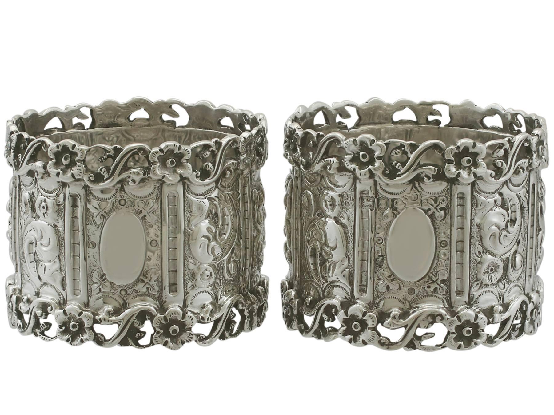 An exceptional, fine and impressive, large pair of antique Edwardian English sterling silver napkin rings; part of our dining silverware collection.

These exceptional antique Edwardian sterling silver napkin rings have a cylindrical shaped