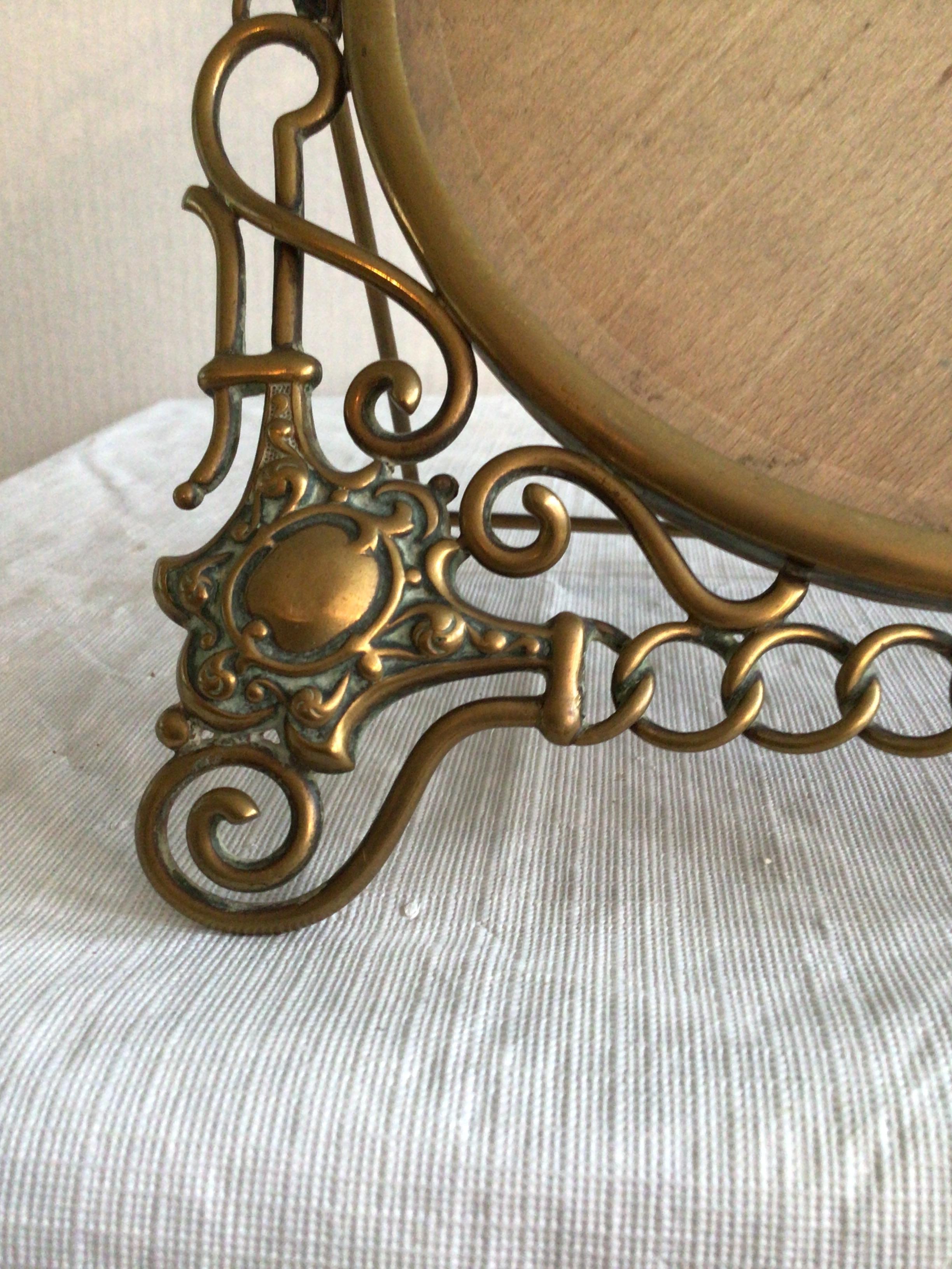 1900's English Scrolled Brass Circular Picture Frame with Medallion Accents For Sale 1