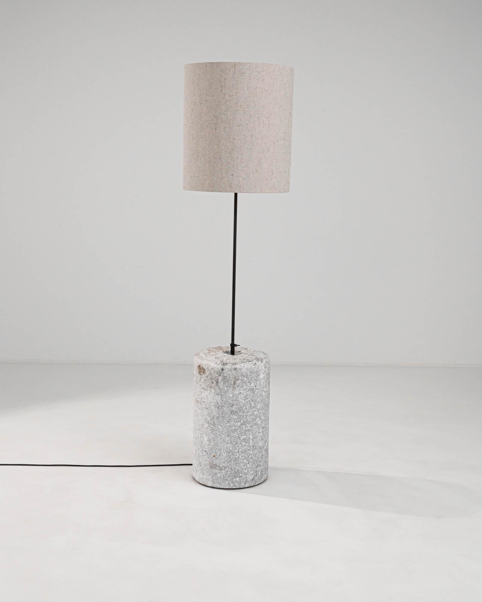 Introducing our early 1900s-inspired European Marble & Metal Floor Lamp, an elegant blend of classic charm and contemporary design. This exquisite piece features a robust, cylindrical base of genuine marble, boasting natural grey veining and