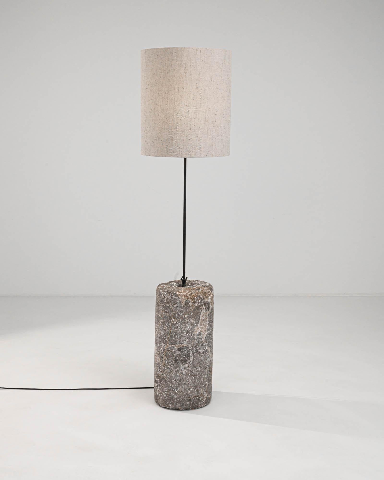 Illuminate your space with the timeless elegance of the 1900s European Marble & Metal Floor Lamp. A celebration of classic style and sophistication, this floor lamp features a genuine marble base, whose unique patterns and warm, earthy tones add an