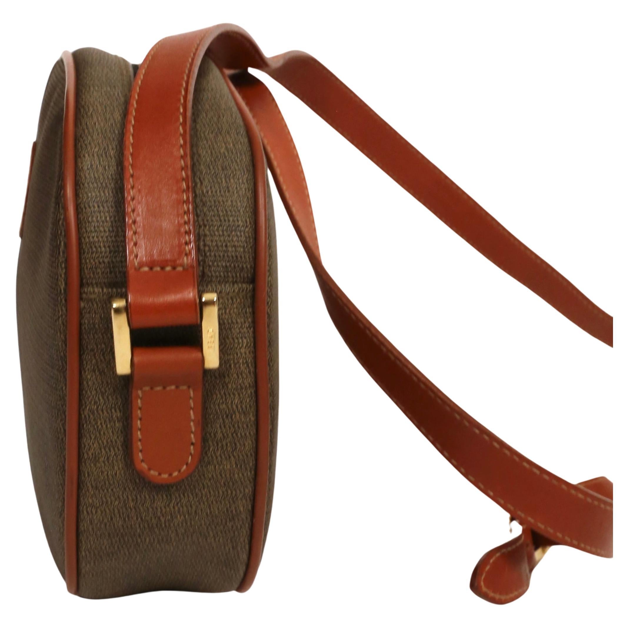 Women's 1990's FENDI oval crossbody bag with logo print and leather trim For Sale
