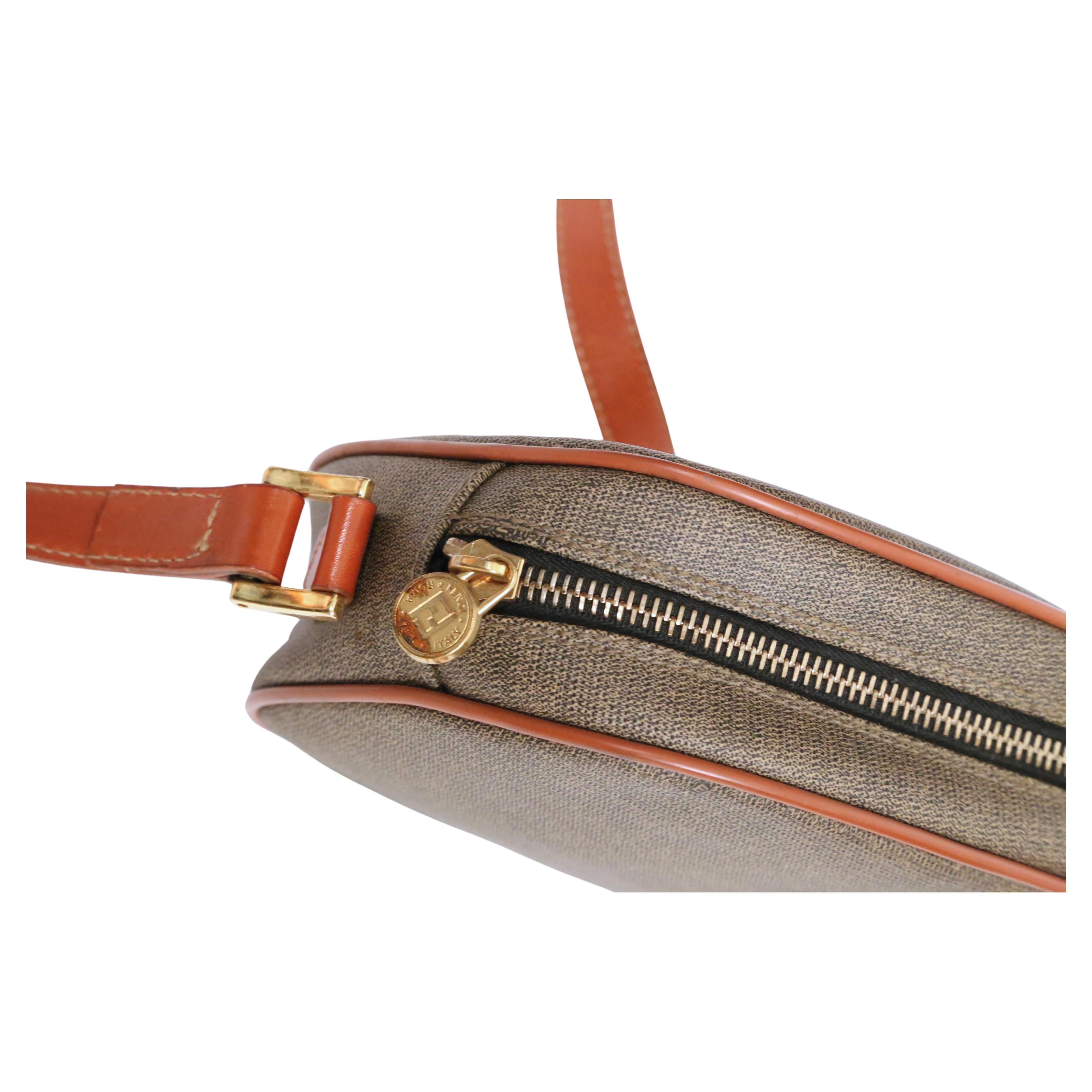 1990's FENDI oval crossbody bag with logo print and leather trim For Sale 1