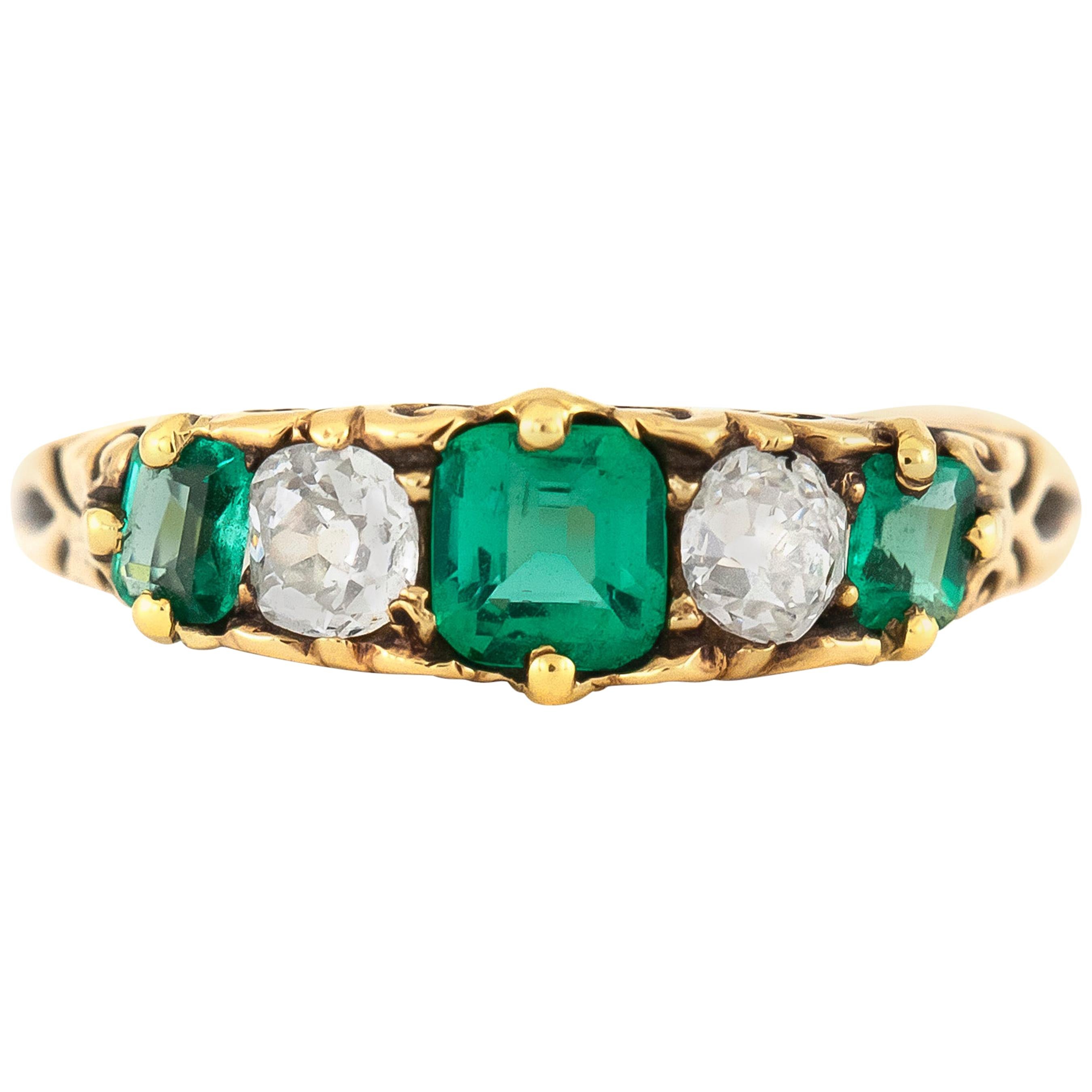 1900s Five Stones Emeralds with Diamonds Ring