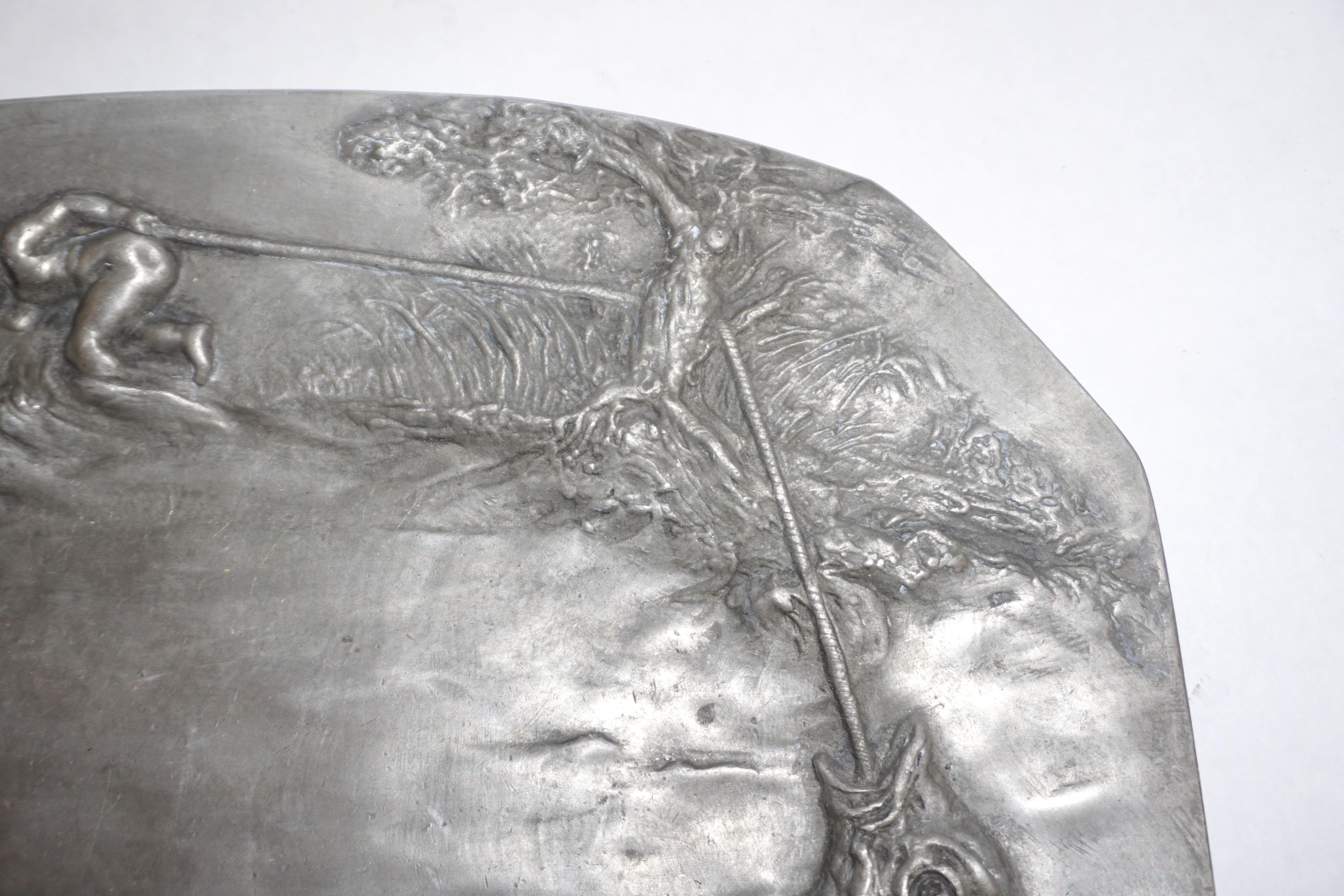 1900s French Art Nouveau Sculpted Pewter Dish with Fishing Putti in Relief In Good Condition For Sale In New York, NY