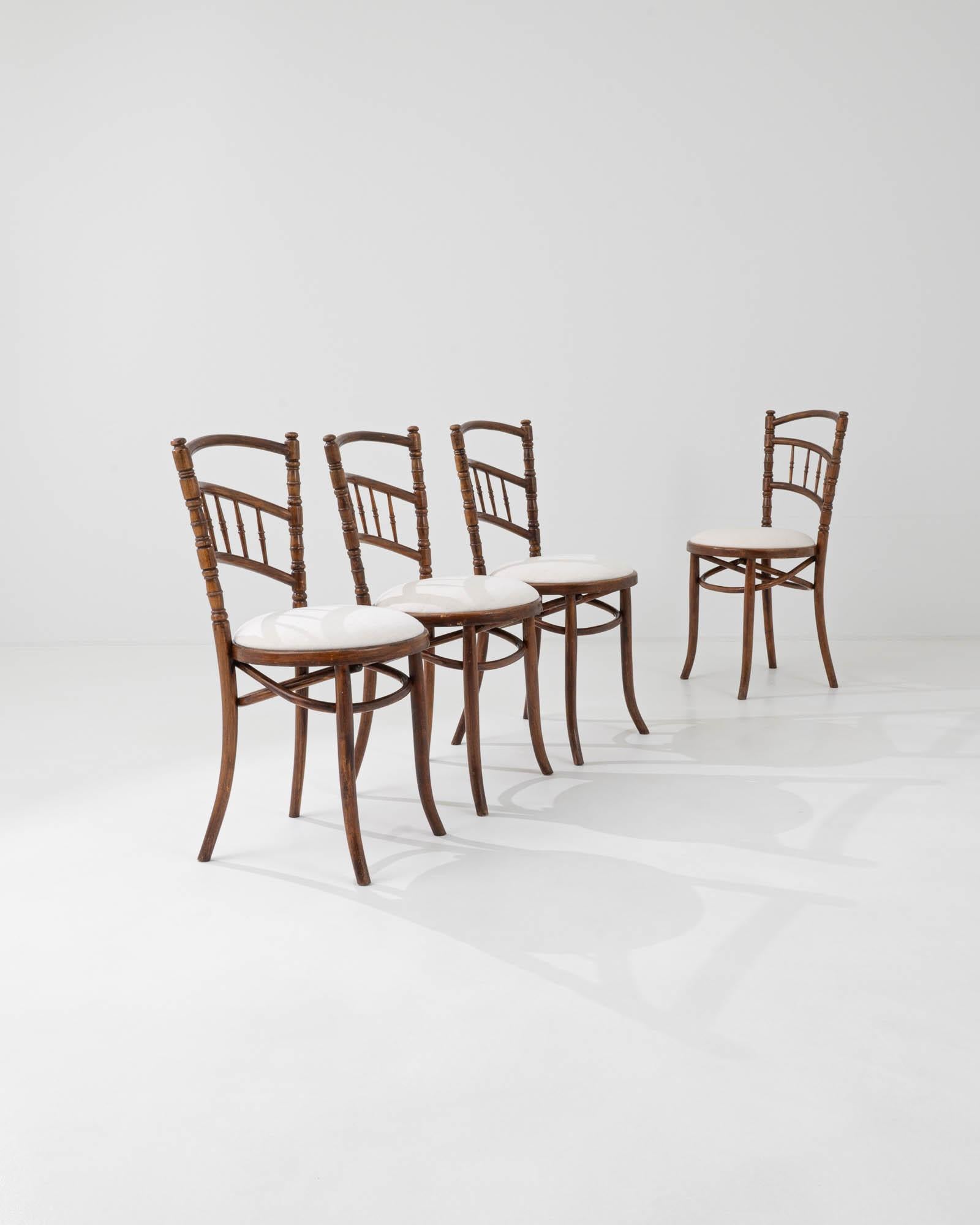 Made in France at the beginning of the 20th century, this set of four classic bistro chairs bear an undeniable resemblance to the early Thonet bentwood chairs that paved the way for the ‘boulangerie’ style, and for mass produced furniture as a