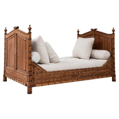 Antique 1900s French Faux Bamboo Daybed With Boucle Upholstered Cushions