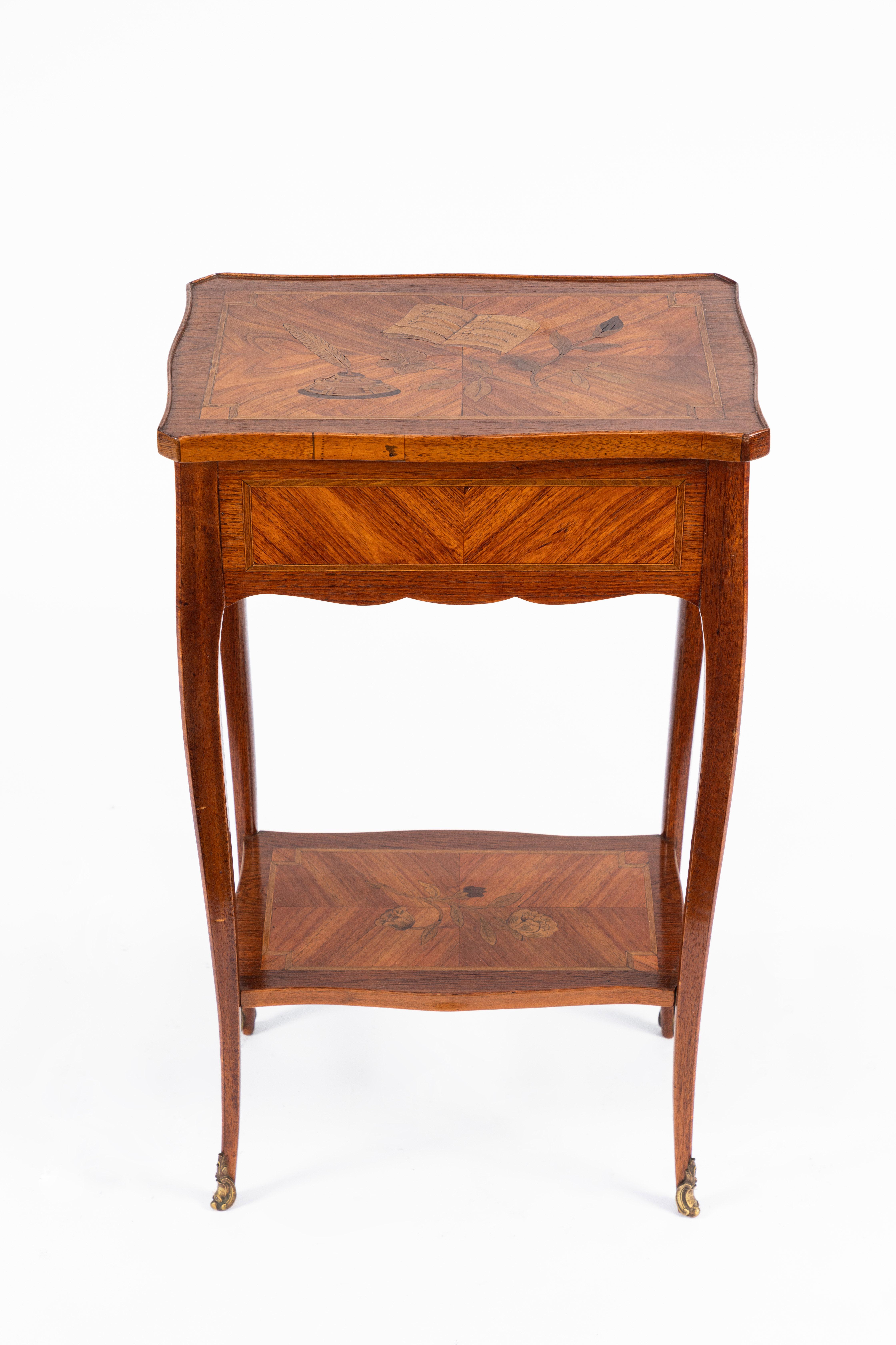 1900s French inlaid side table with single drawer and fine inlaid details. Bronze Accents.