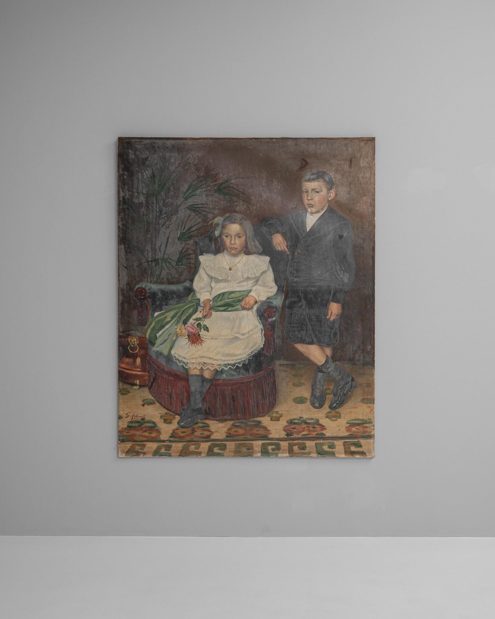 This early 20th-century French portrait painting captures a tender domestic moment, depicting two children in formal attire posed within an interior setting. The artist’s use of muted tones and naturalistic detail conveys a sense of intimacy and