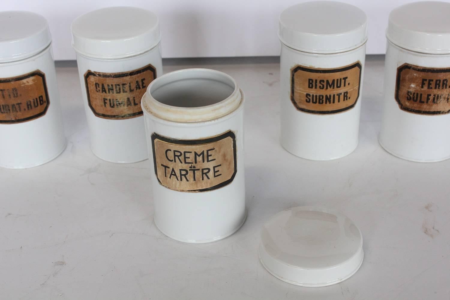 1900s French Pharmacy Porcelain jars with original tags. One has an old crack in the back.