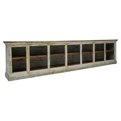 1900s French Wood Patinated Shop Counter with Open Storage