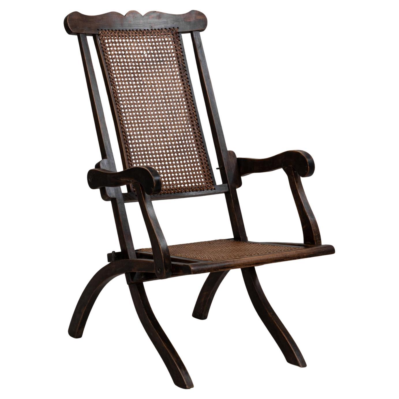 Fauteuil pliant en bois français des années 1900 avec dossier en canne