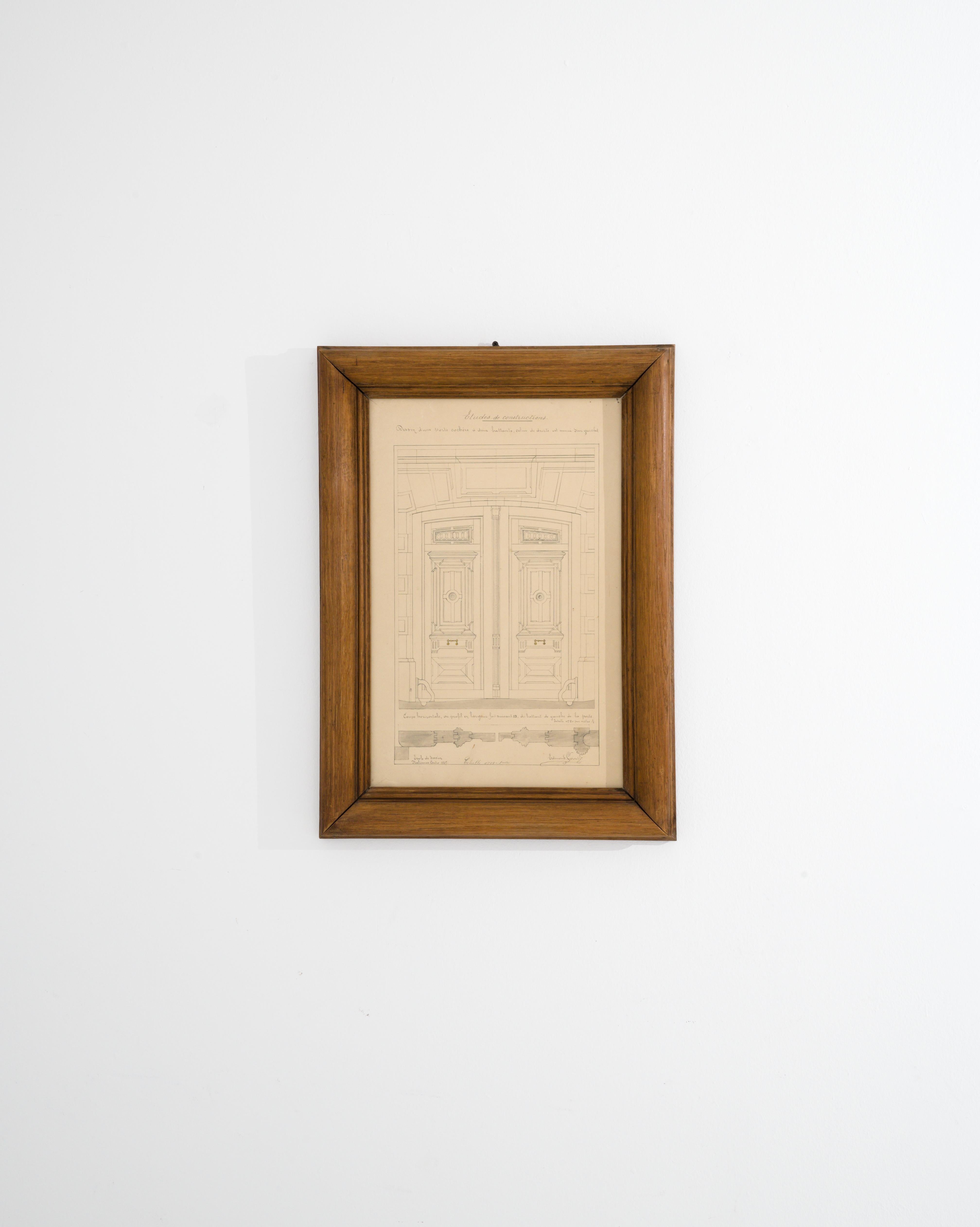 A drawing with a wooden frame made in France, circa 1900. This fascinating design depicts a set of two paneled doors, framed by a stone archway, that has been rendered scrupulously on paper. This simple, unassuming drawing conveys a sense of refined