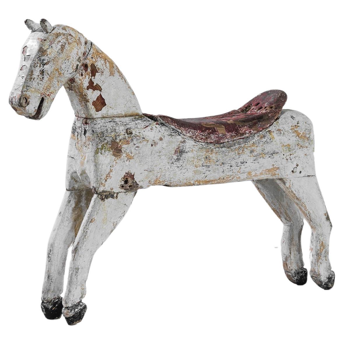 Années 1900, cheval français en bois avec selle en vente
