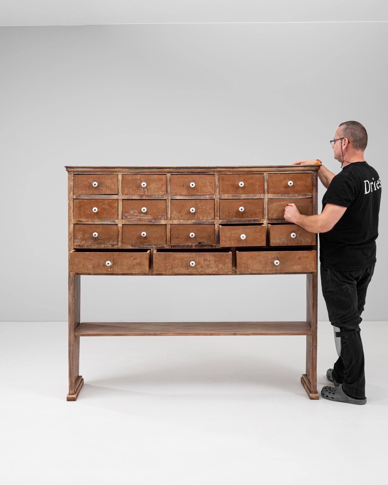 Francese 1900s French Wooden Pharmacy Chest Of Drawers in vendita