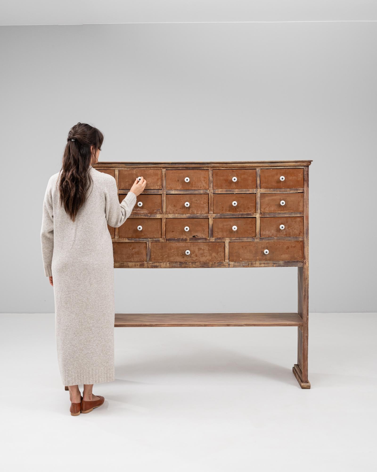 XX secolo 1900s French Wooden Pharmacy Chest Of Drawers in vendita