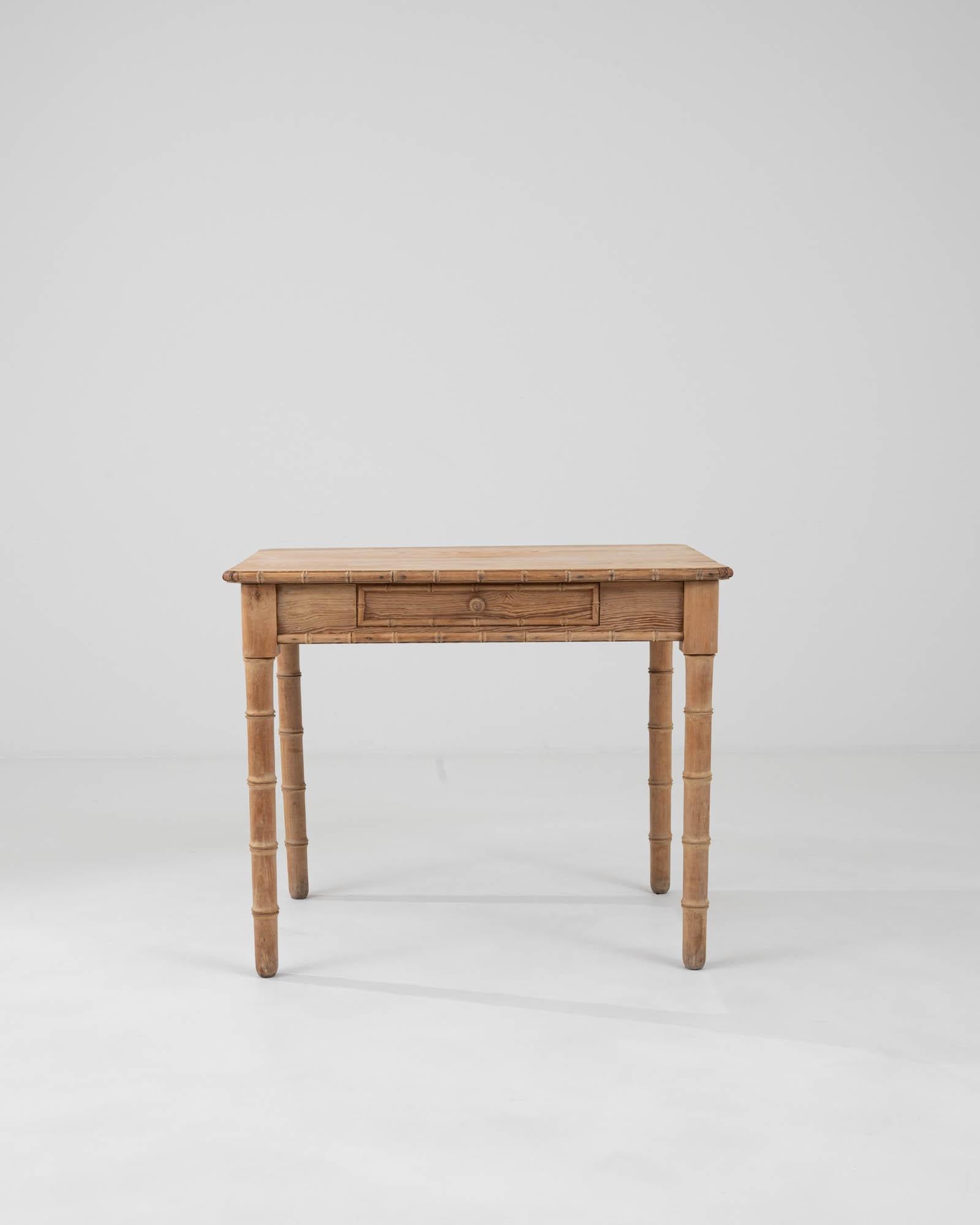 Introducing our exquisite 1900s French Wooden Desk, a timeless piece that exudes classical elegance and craftsmanship. This charming table, crafted from rich, aged wood, brings a piece of French history into your space, featuring distinctive