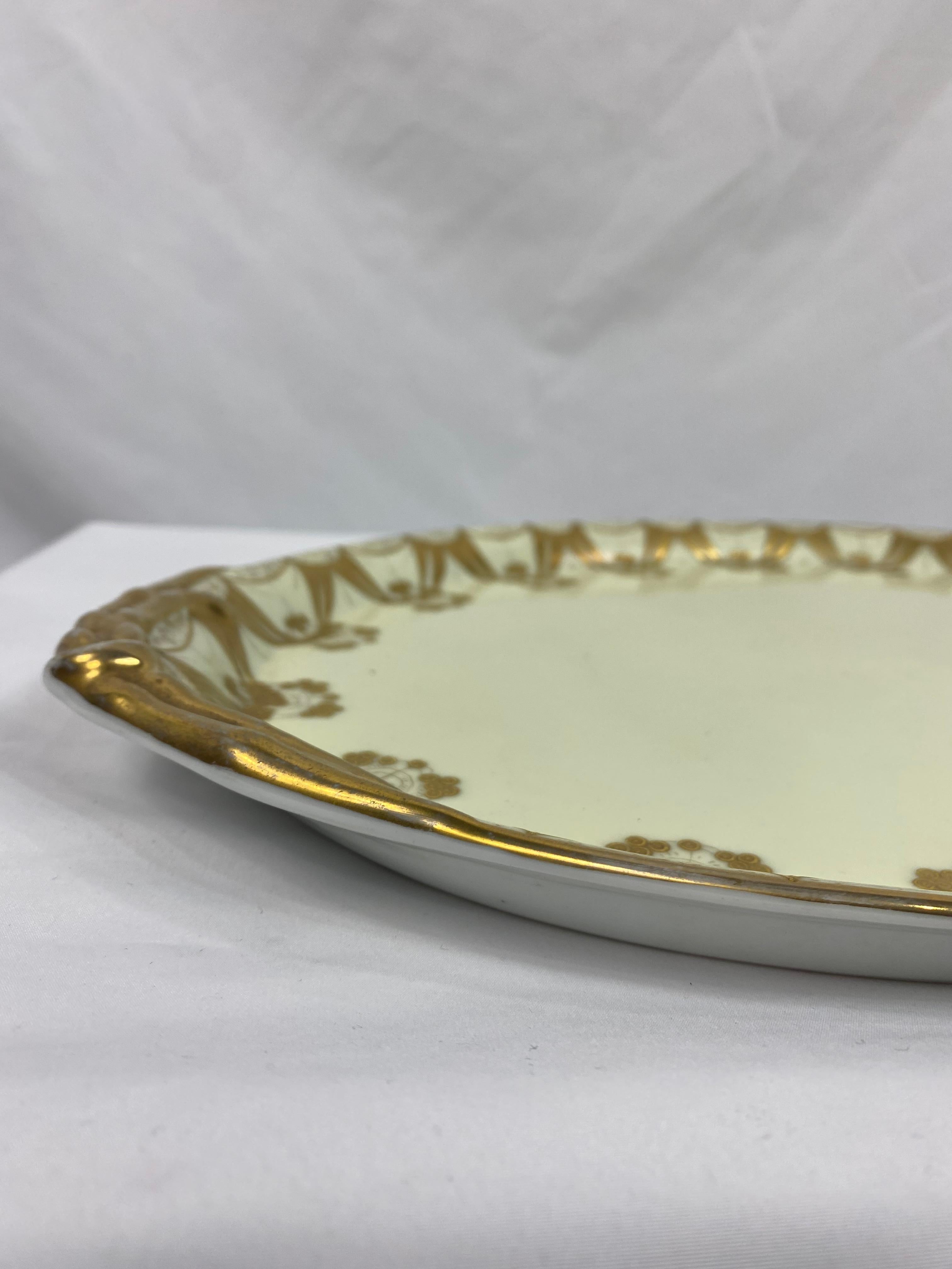 Product details:

Gardner was a very famous manufacturer that made porcelain pieces for the royalty and elite of Russia.   
The tray is made of porcelain. It features hand painted ornaments done with gold leaf. This is used as a serving platter for