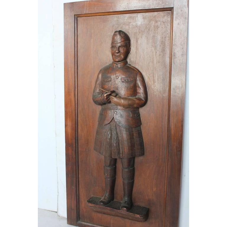 1900s hand carved scotsman tobacco store panel.