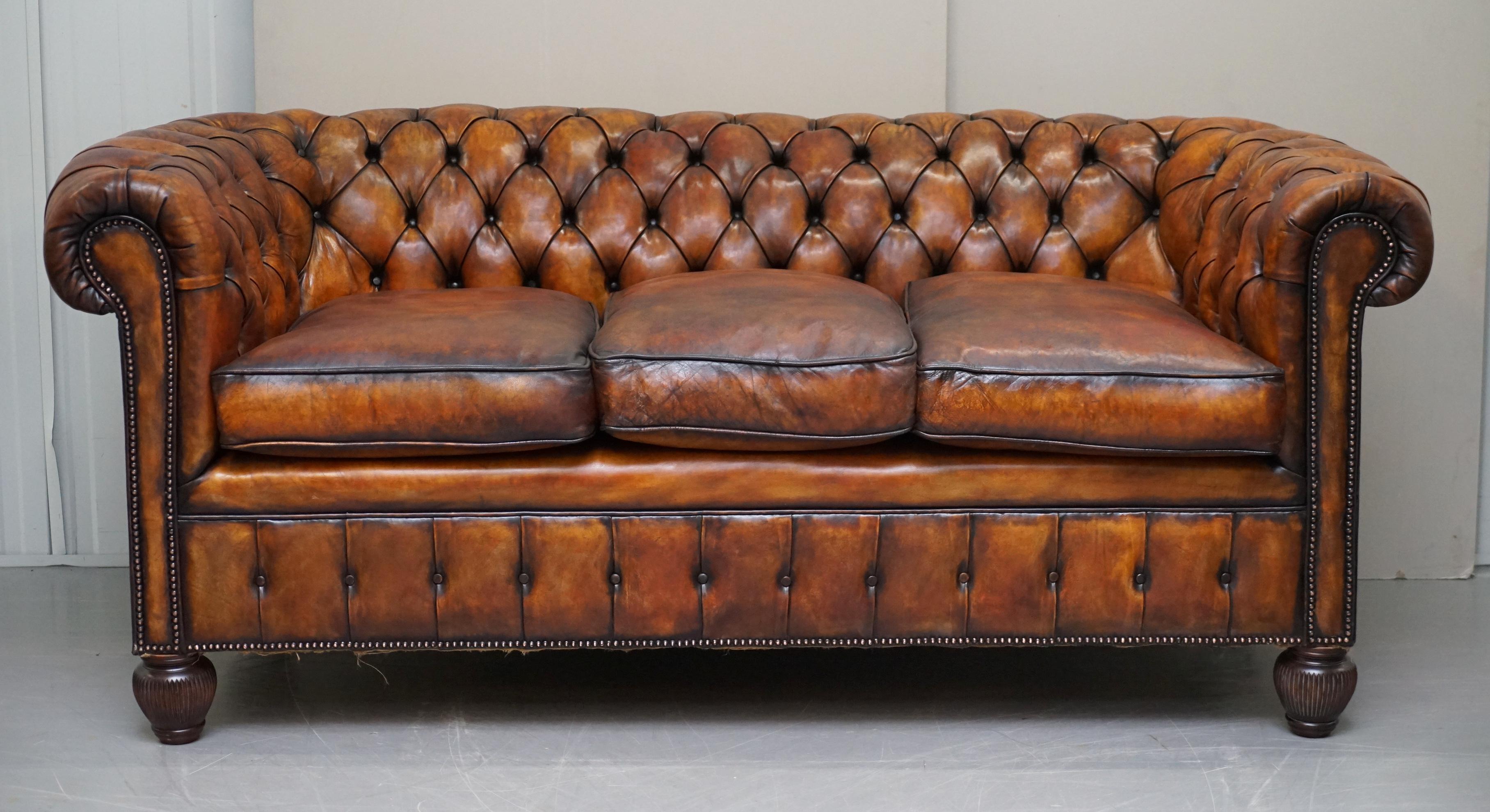 We are delighted to offer for sale this stunning fully restored circa 1900 hand dyed whiskey brown leather Chesterfield sofa with feather filled cushions

This sofa is one of the nicest I have seen in terms of original patina, it looks and feels