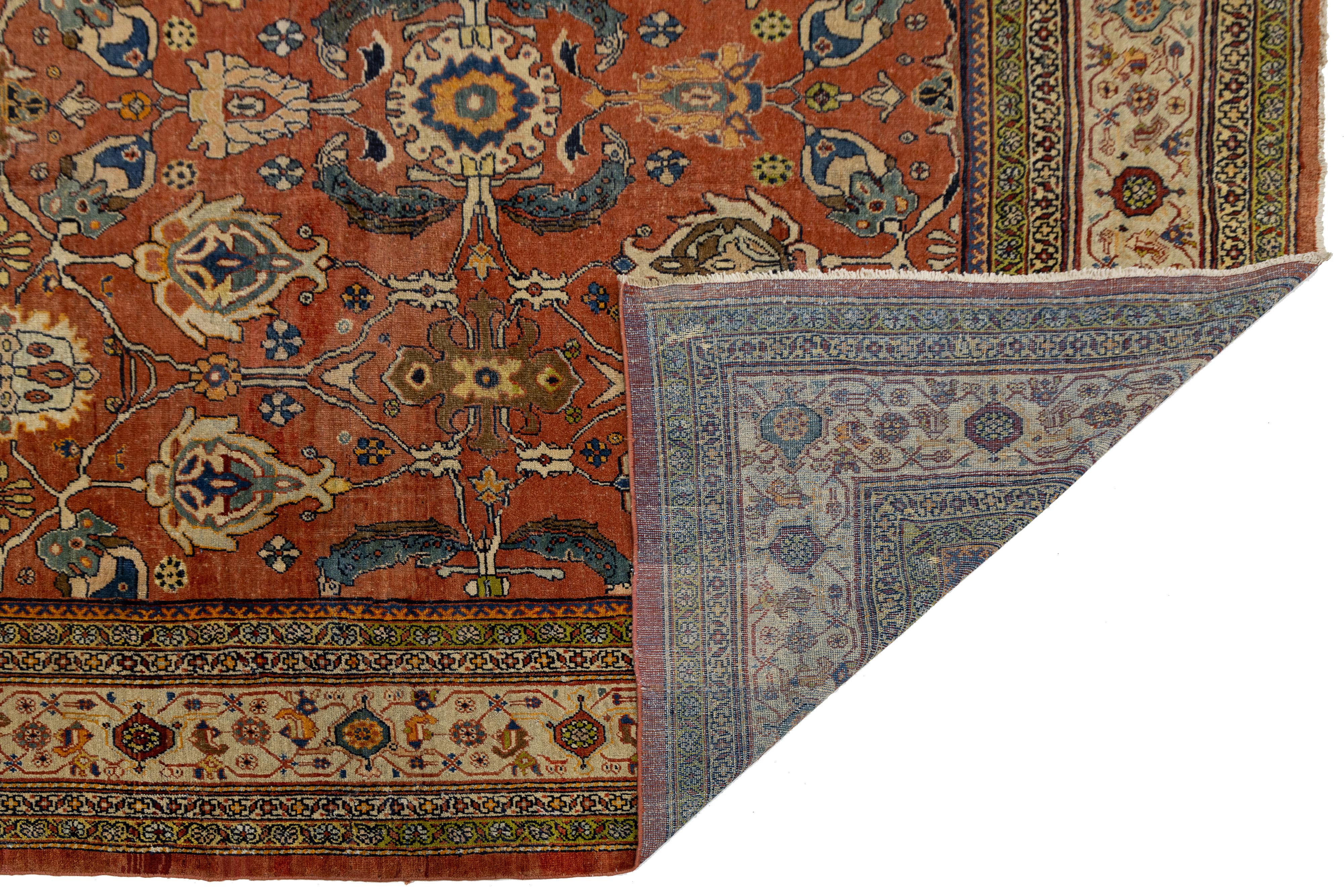 Islamique 1900s Handmade Persian Mahal Wool Rug In Reddish-Brown With Floral Design en vente