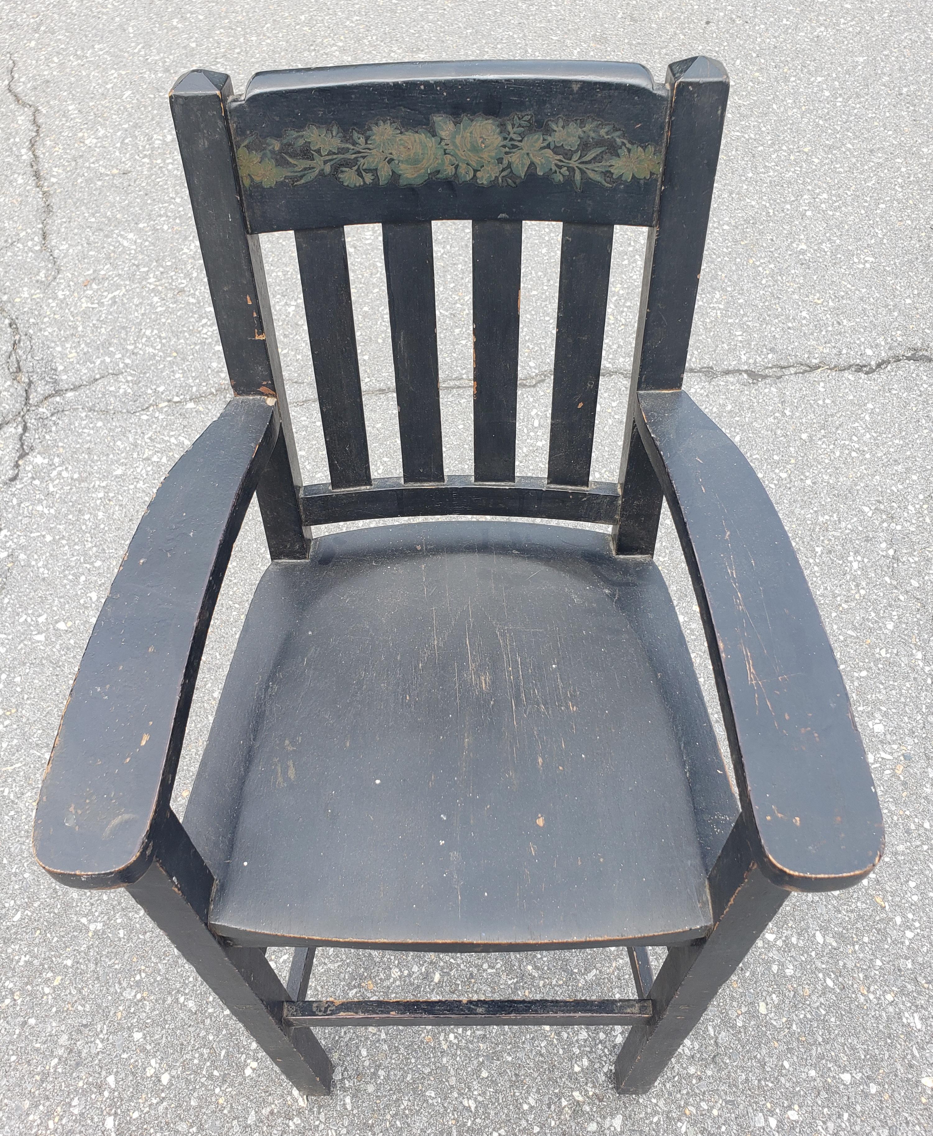 An early 1900s Heywood Brothers and Wakefield Company of Baltimore Ebonized oak and Decorated Youth High Chair in very good sturdy condition and great patina. Measures 17.5