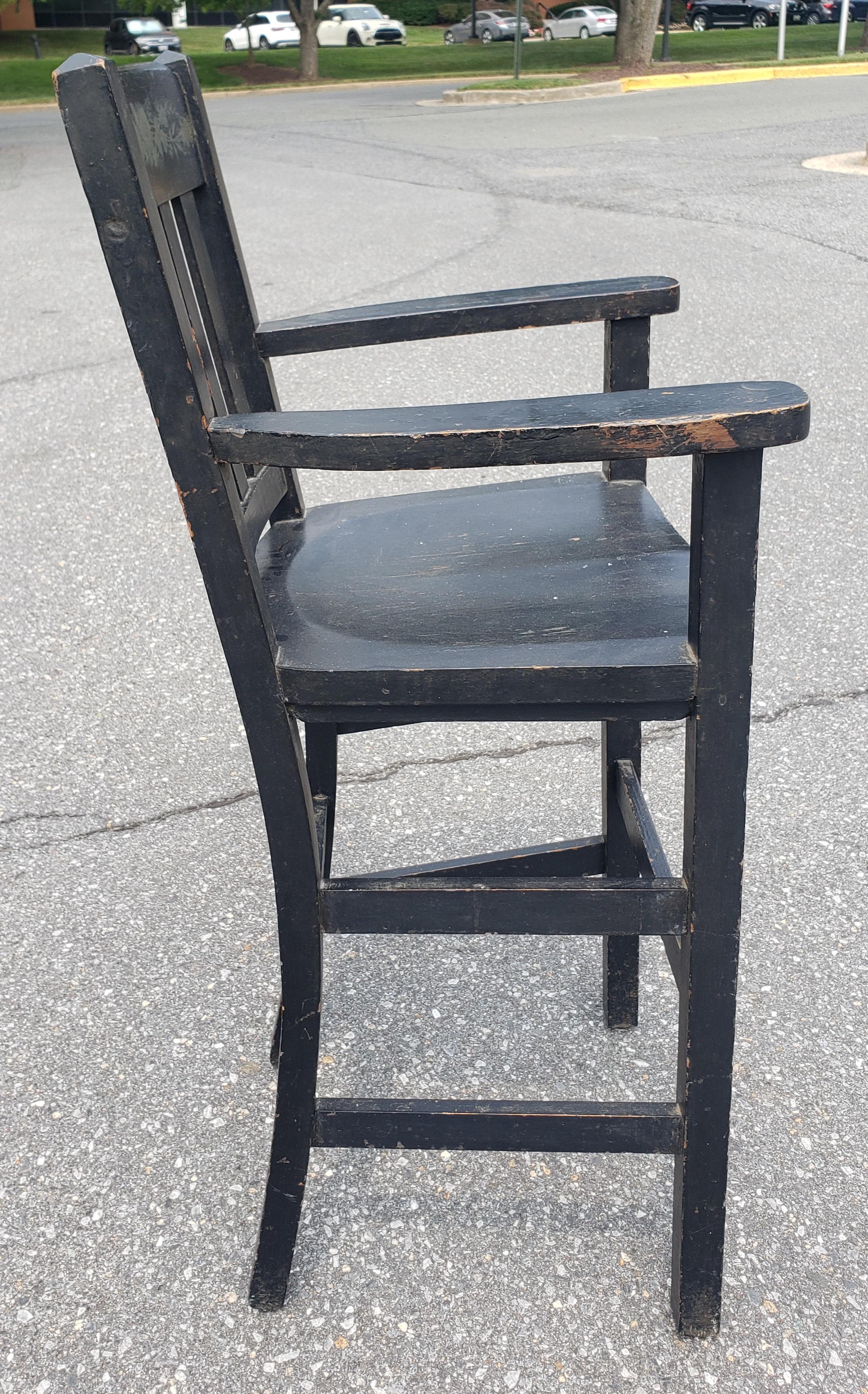 1900s Heywood Brothers and Wakefield Co Ebonized and Decorated Youth High Chair In Good Condition For Sale In Germantown, MD