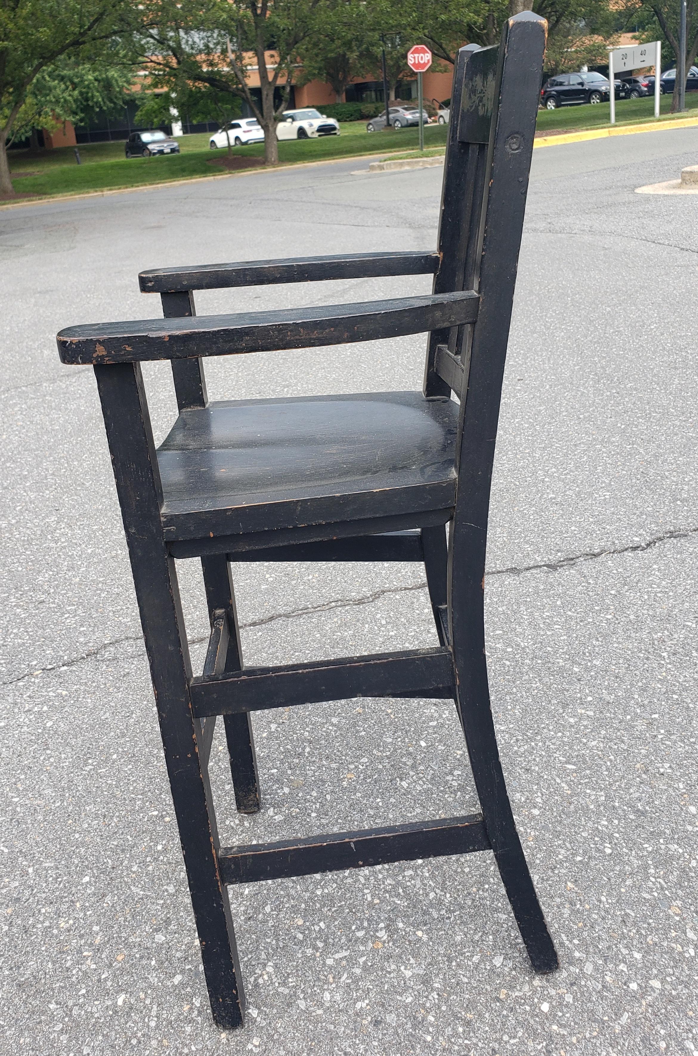 Oak 1900s Heywood Brothers and Wakefield Co Ebonized and Decorated Youth High Chair For Sale