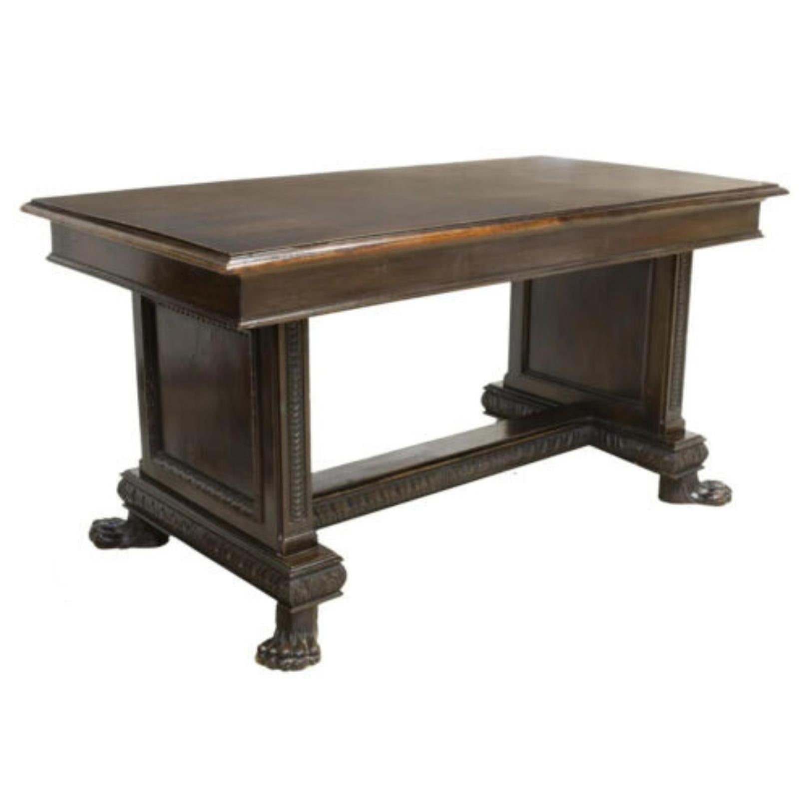 Handsome Table, Library Italian Renaissance Revival, Walnut, Trestle Base, Early 1900s, 20th century!!

Italian Renaissance Revival walnut library table, 20th century, the rectangular top rising on a carved trestle base, all over paw feet, approx