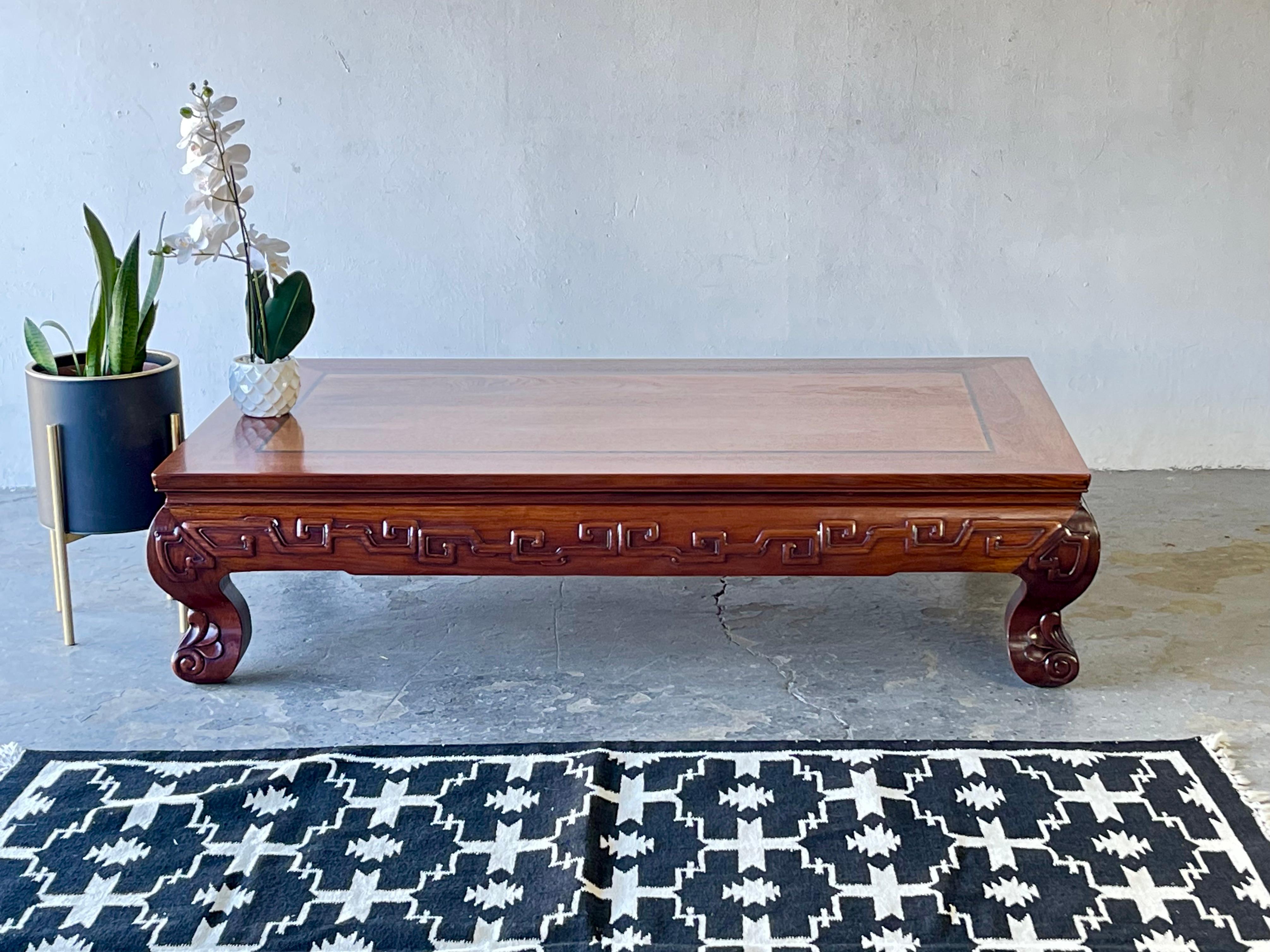 Stunning early to mid 1900’s hand carved Japanese solid Rosewood Zataku low table or coffee table. Table is inlaid with an ebony wood border. The hand carving is Elegant and beautiful. 

Zataku is the ce
nter of Japanese life, eating,
