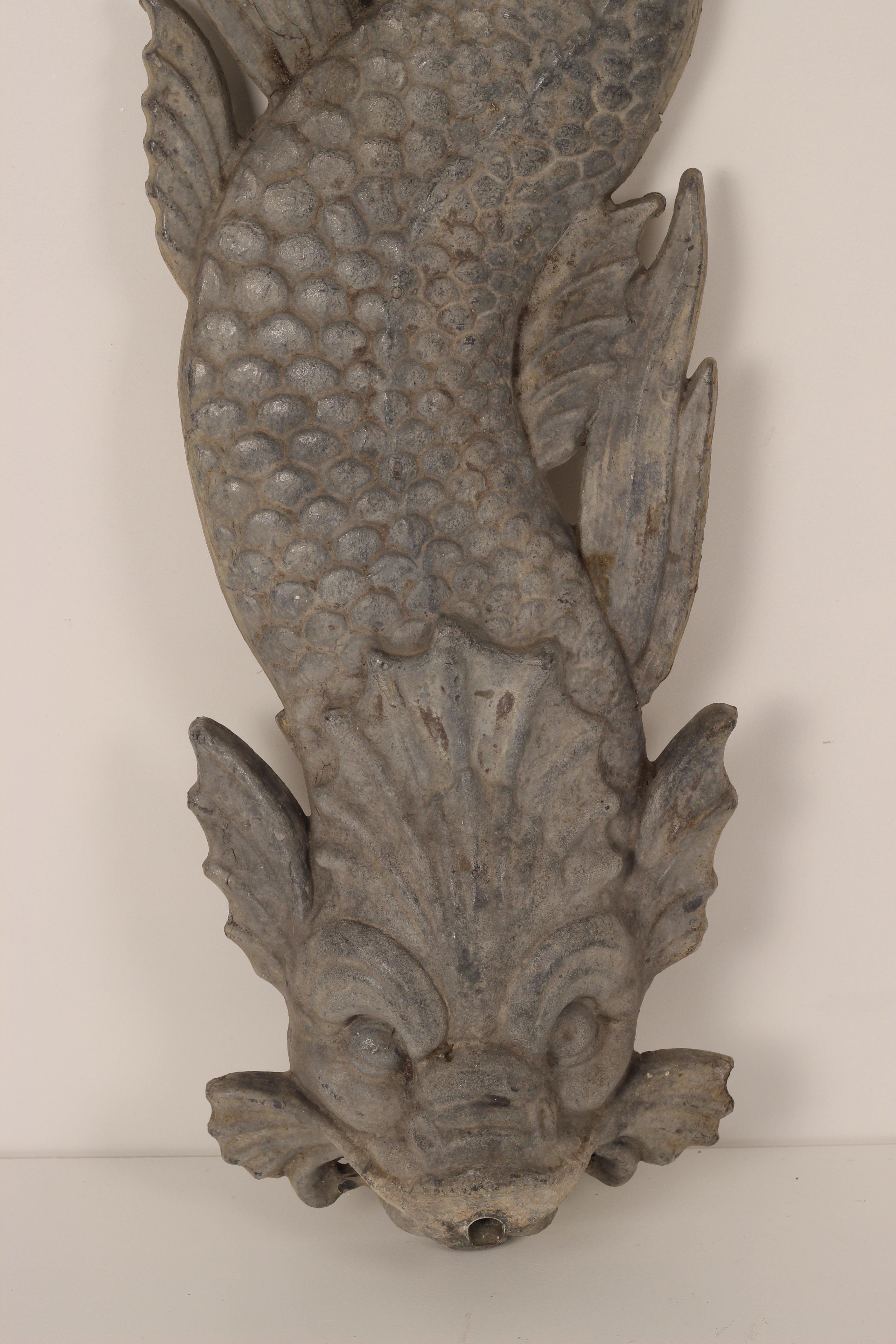 An early 1900’s cast lead fountain modelled as a Sturgeon amongst bull rushes with concealed water spout produced by H. Crowther Ltd of Chiswick. The piece shows years of being exposed to the elements, which has produced a wonderful patina on the