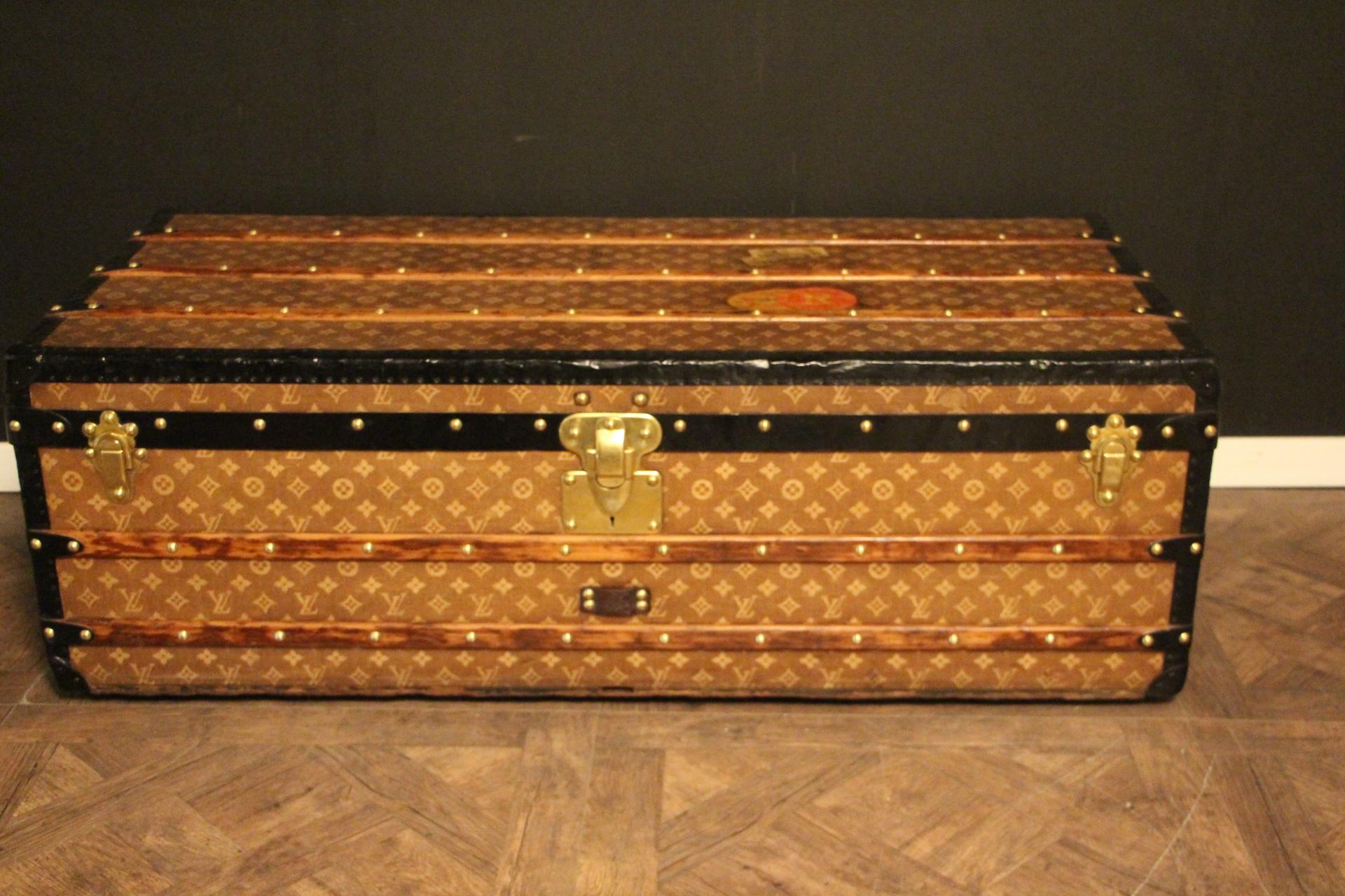 This spectacular Louis Vuitton trunk is very unusual for two reasons. First, its monogram canvas is woven canvas, a very rare canvas that Louis Vuitton used only from the very end of the 19th century till early 20th century. Second, its size is very