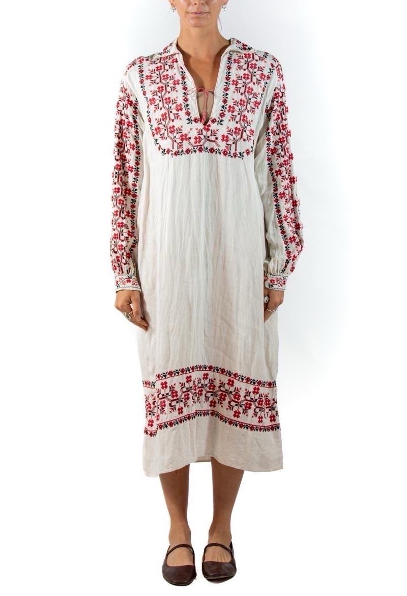 In great condition for the age, does have some areas of old stains and holes.  1900S Off White Floral Linen Dress 