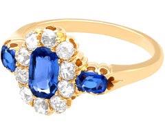Oval Cut Sapphire and Diamond 18K Yellow Gold Cocktail Ring