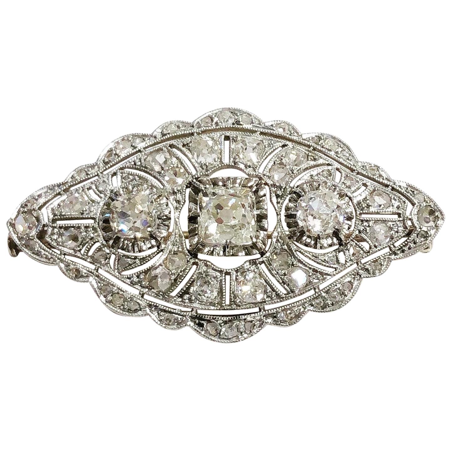 1900s Oval Diamond Filigree Platinum Yellow Gold Brooch