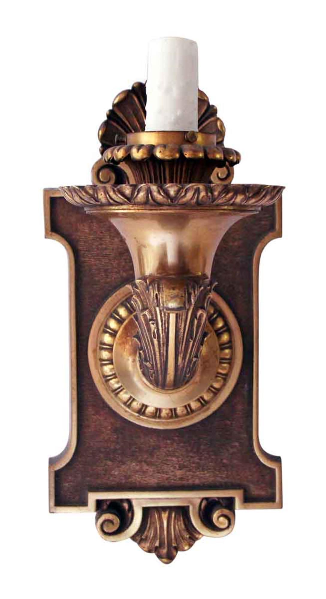 Heavy bronze EF Caldwell one arm sconces. Priced as a pair. This can be seen at our 2420 Broadway location on the upper west side in Manhattan, circa 1900.