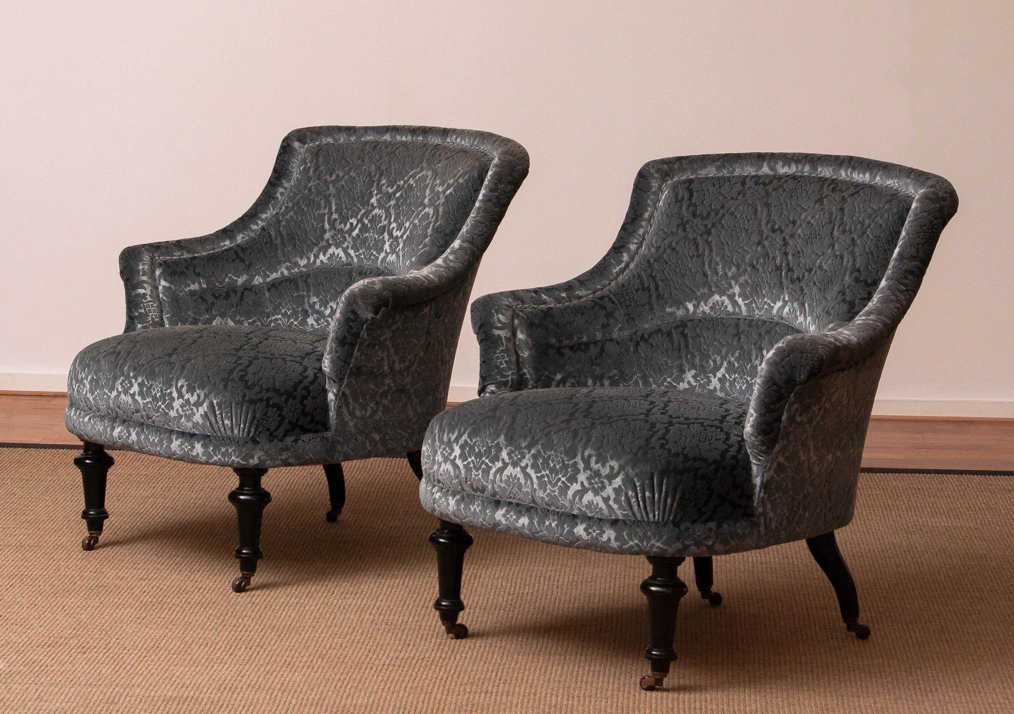 Beautiful pair of Napoleon lll chairs in grey velvet with black legs on wheels.
They are in a very nice condition.