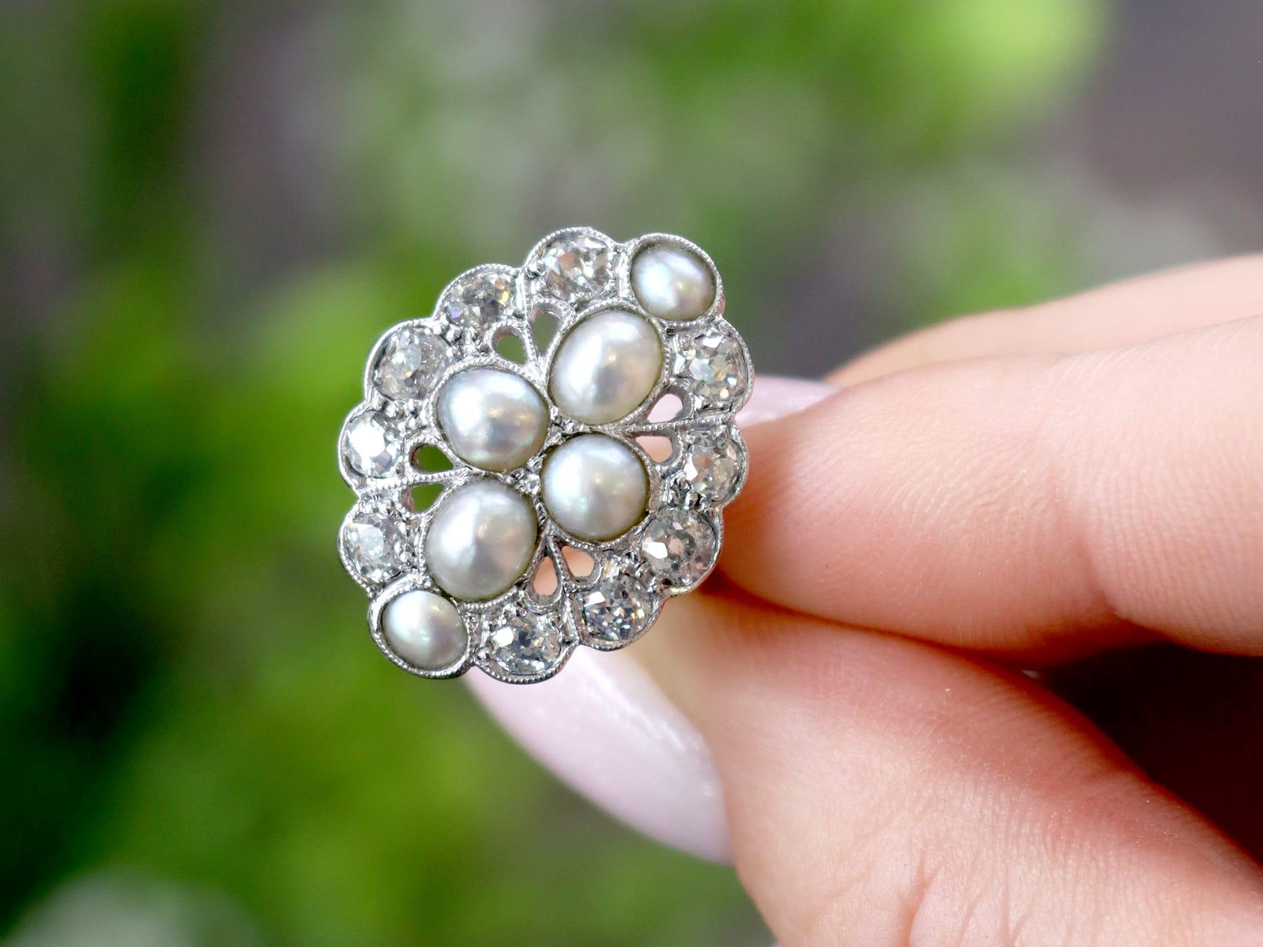 A very fine and impressive antique bouton pearl and 1.73Ct diamond 18k white gold dress ring; part of our antique jewelry / estate jewelry collection.

This very fine and impressive large antique dress ring has been crafted in 18k white gold.

The