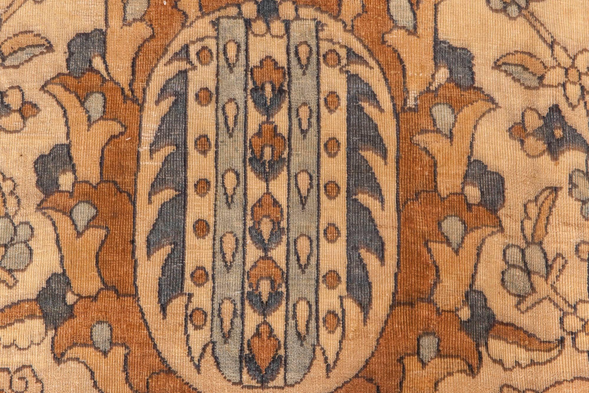 1900s Persian Kirman brown, beige and blue handmade wool rug
Size: 12'3