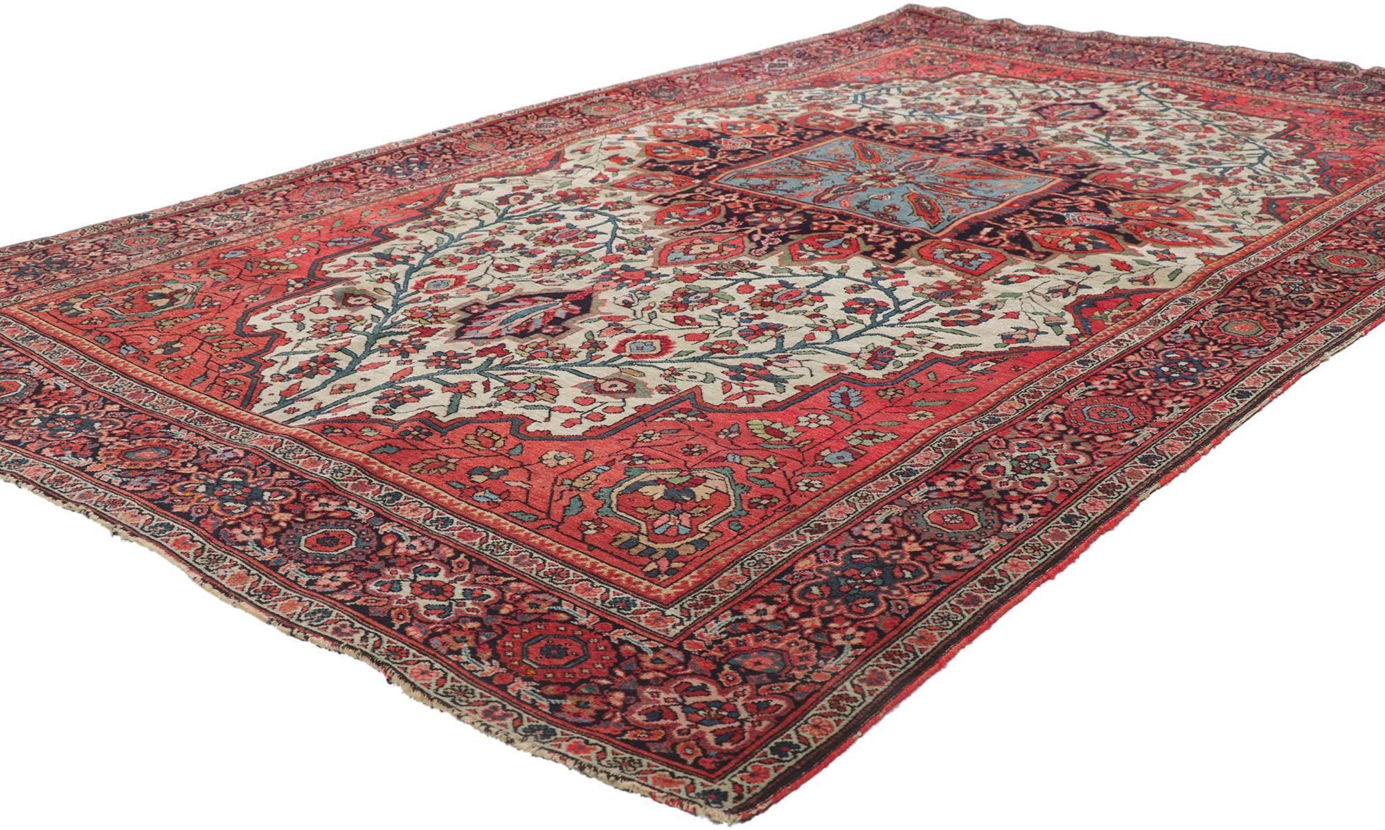 76924 Tapis persan ancien Sarouk Farahan, 04'00 x 06'08. Vision resplendissante de l'art persan, ce tapis Sarouk Farahan antique en laine noué à la main se déploie comme un jardin fleuri enfermé dans l'architecture d'une géométrie sacrée. Tissé au