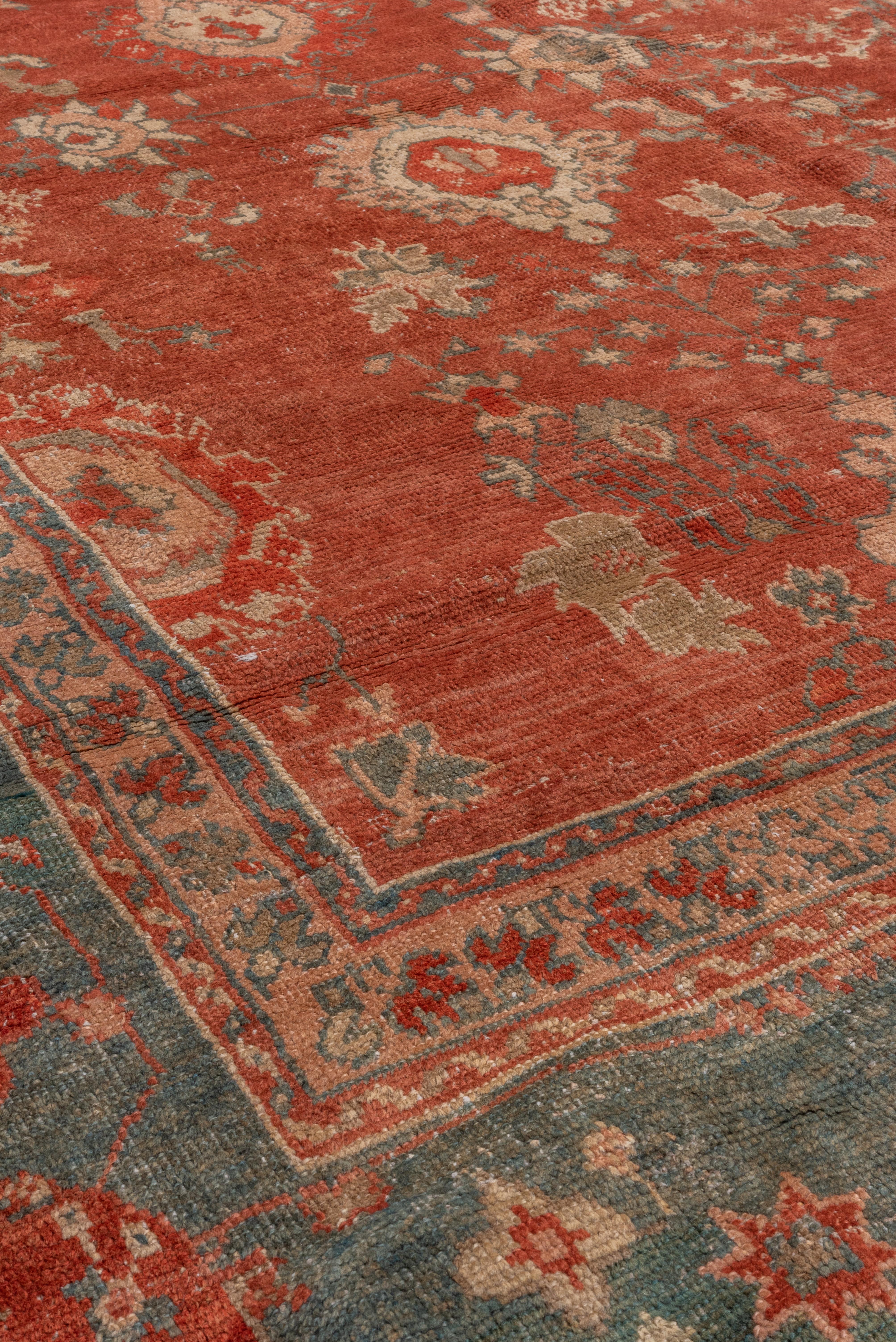 Wool 1900s Rare Antique Turkish Oushak Carpet, Rusty Red Allover Field, Green Borders For Sale