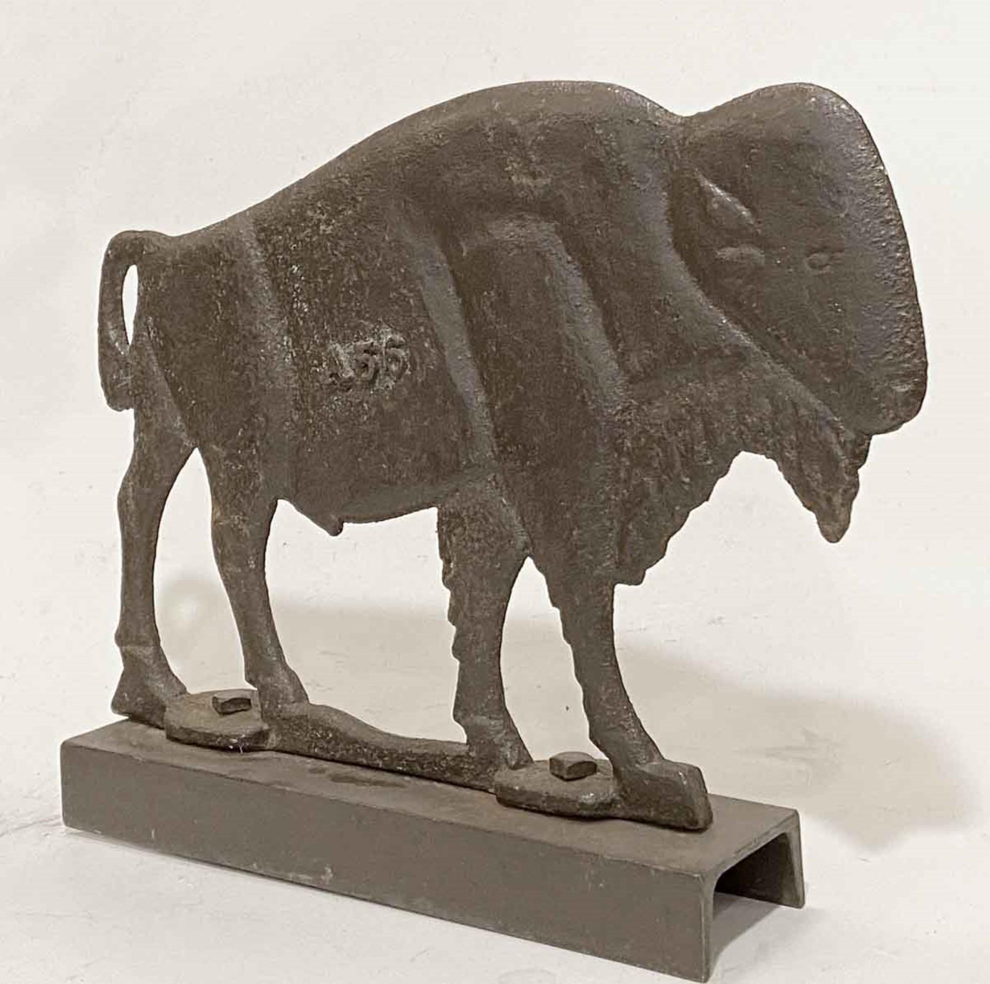 Rare. This is a 1900s antique cast iron bison Midwest windmill weight mounted to a steel base. These were used to counterbalance the fan so the windmill swung freely. Stamped A56 on one side. Primitive style. This can be seen at our 333 West 52nd St